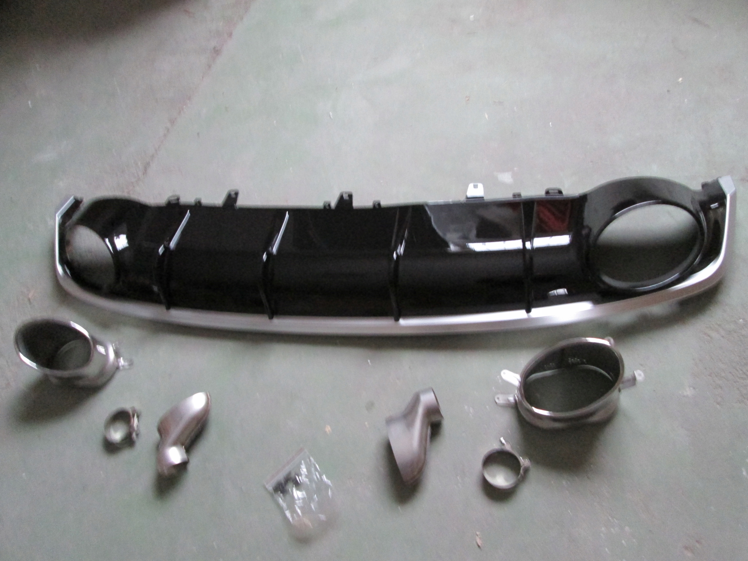 Dyfuzor tylnego zderzaka Audi A7 2016-2019 s-line EAN (GTIN) 0720158384677