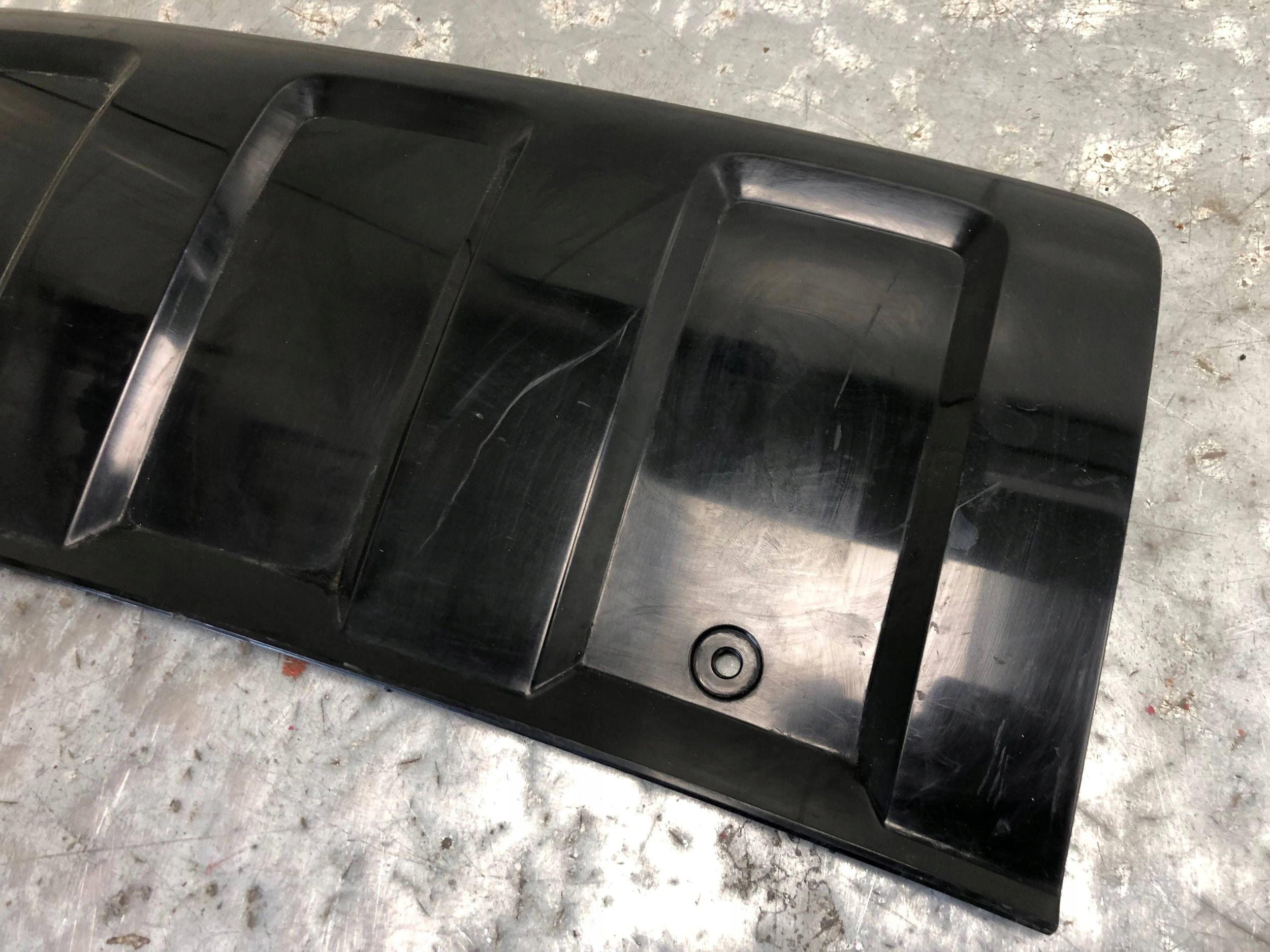 moulding diffuser of a bumper rear part AUDI Q7 4L 4L0807819H