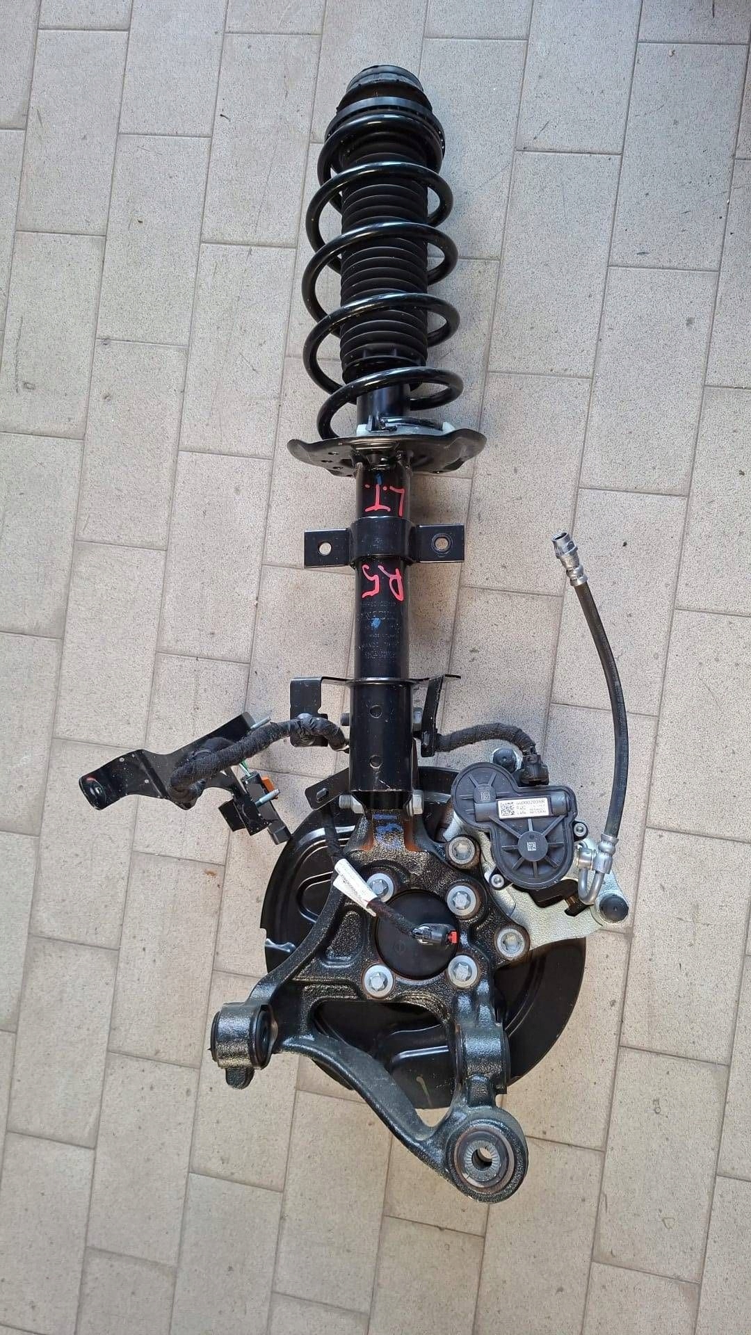 McPherson swing shock absorber rear part side left Renault 5 E-Tech 562103560R
