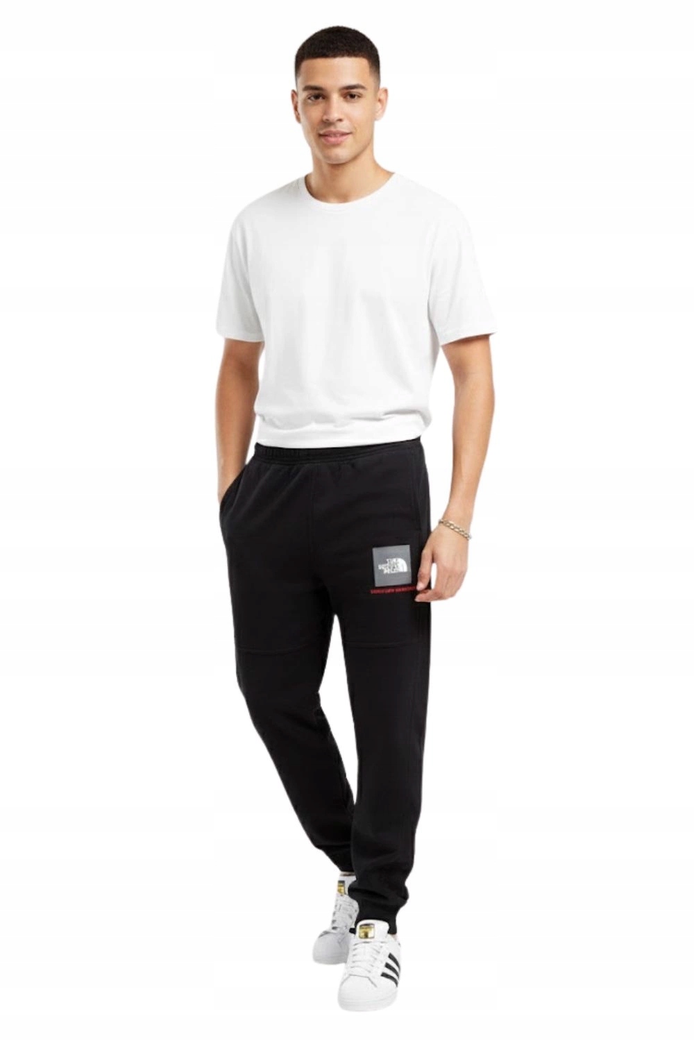 Kalhoty The North Face Fine Box pánské sportovní tepláky pohodlné černé, velikost Xs