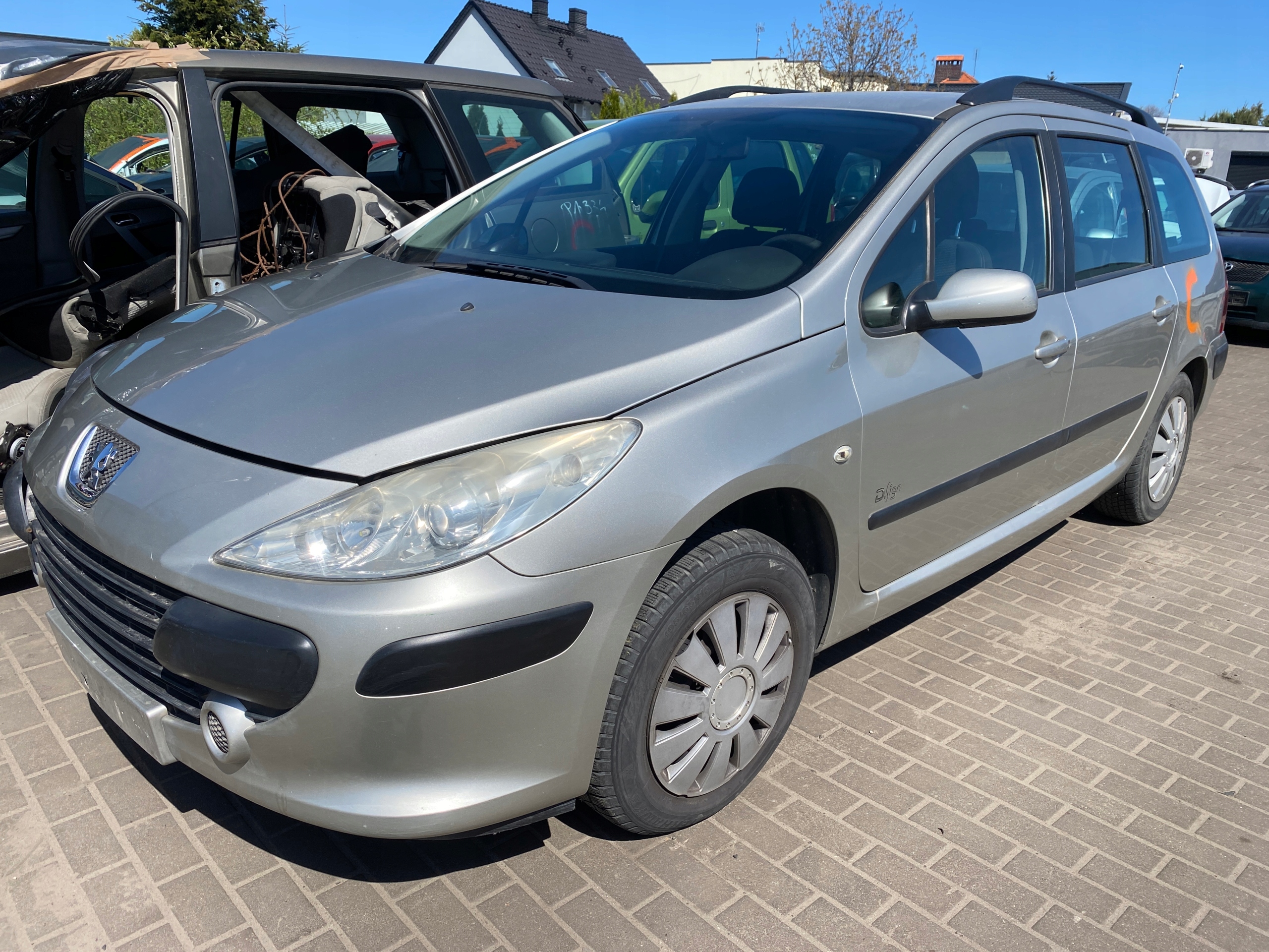 REFLEKTOR light left front front Peugeot 307 SW 05-08