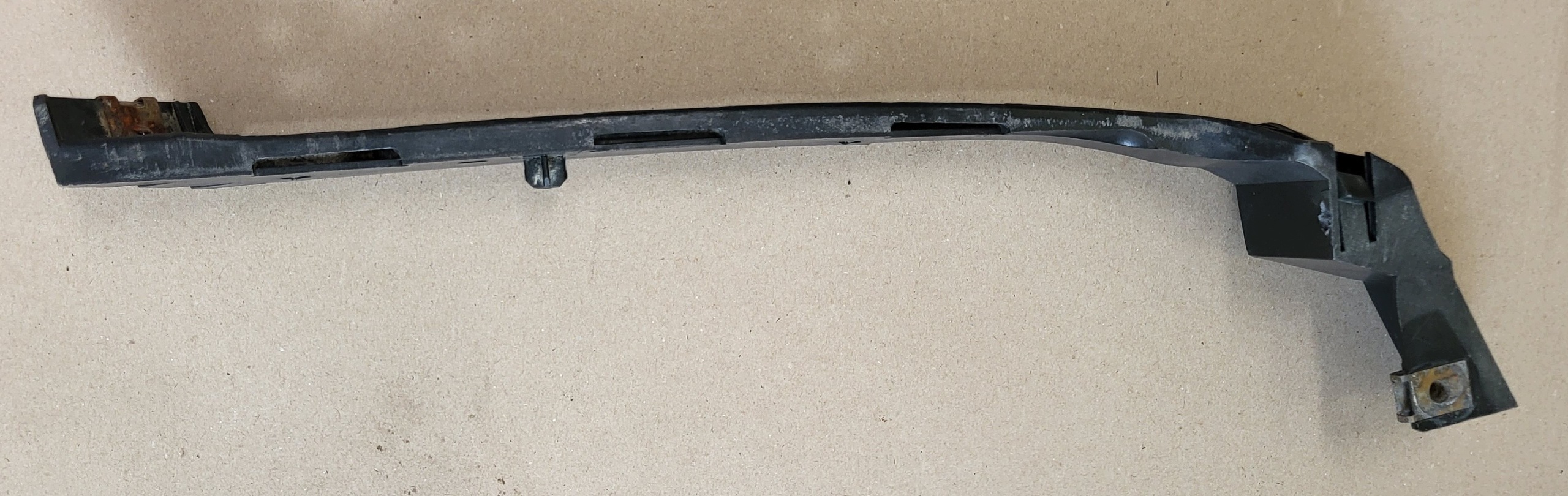 support holder of a bumper left front console SAAB 9-5 95 5495049 OE