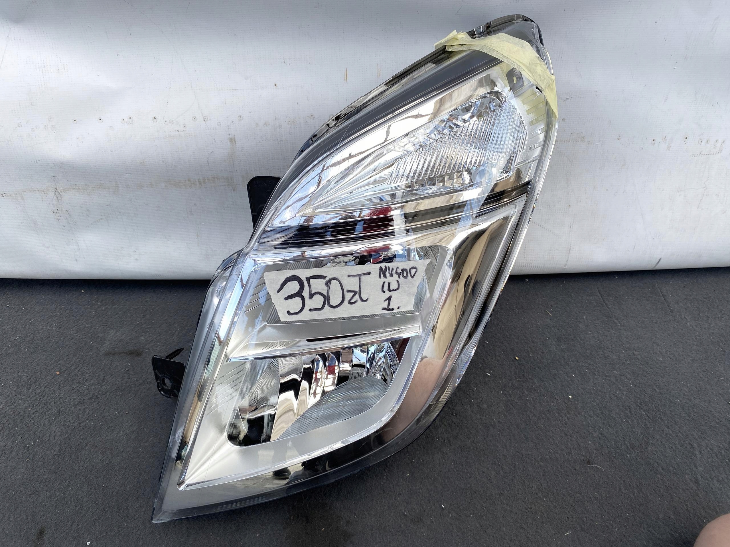 NISSAN NV400 10- light REFLEKTOR front left left original