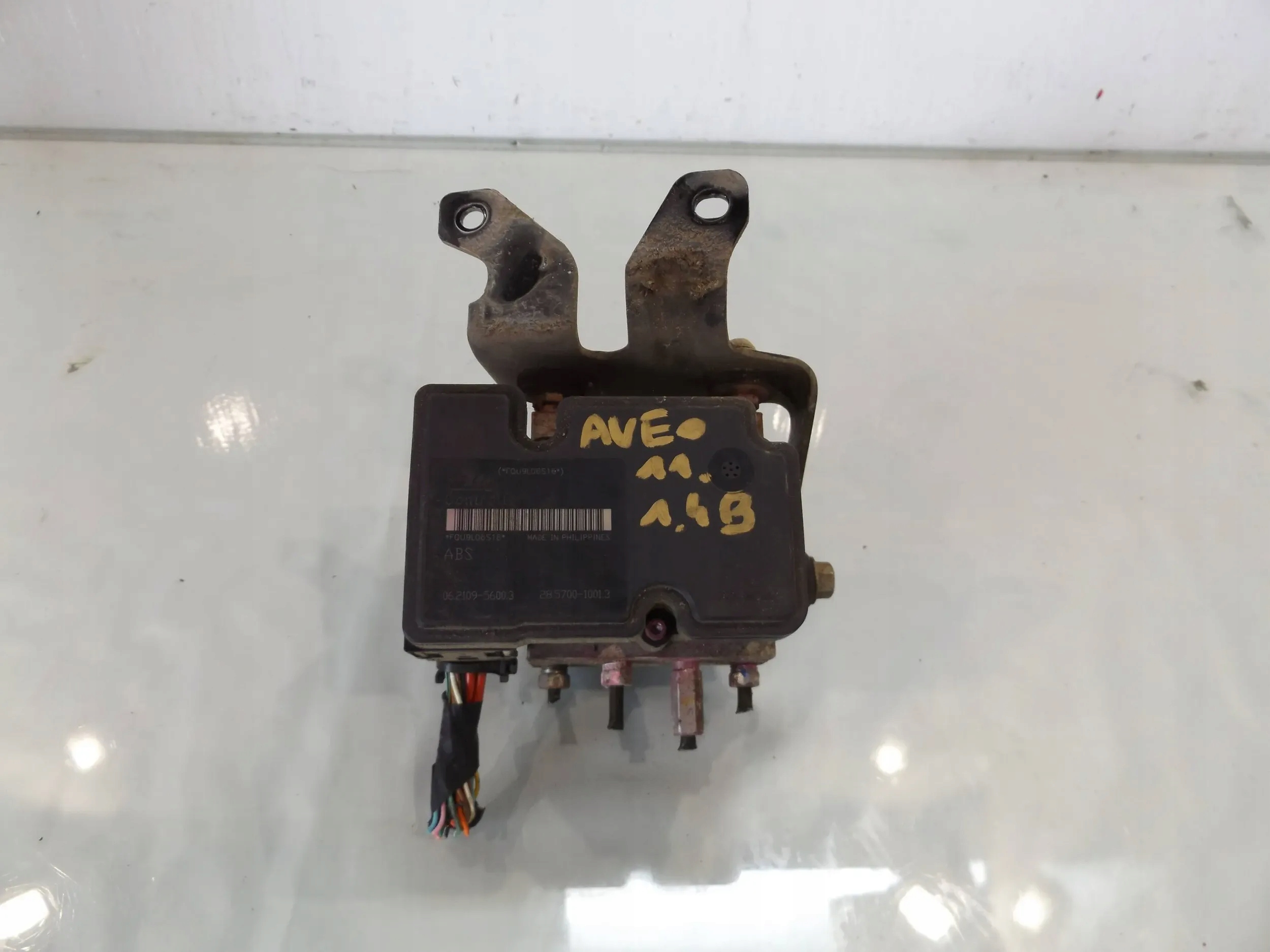 Aveo T250 насос ABS 96964985