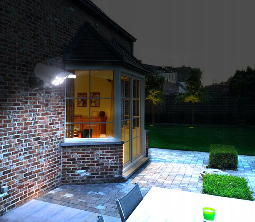 KAMERA ATRAPA LAMPA SOLARNA MONITORING ZEWNĘTRZNA 2W1 PILOT MOCNA STRASZAK Kolor biały