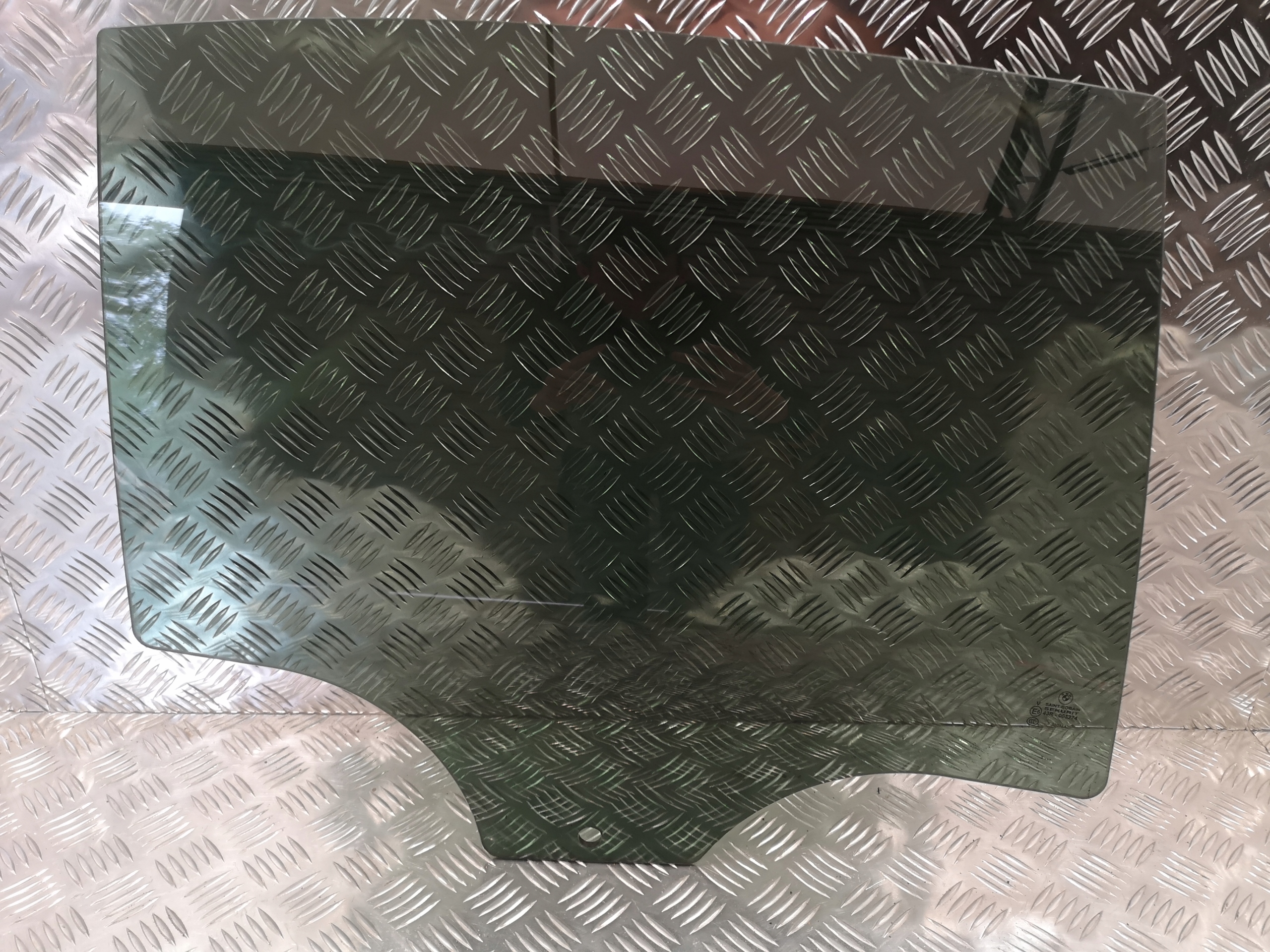 Стекло двери п зд M-packet темное BMW F01