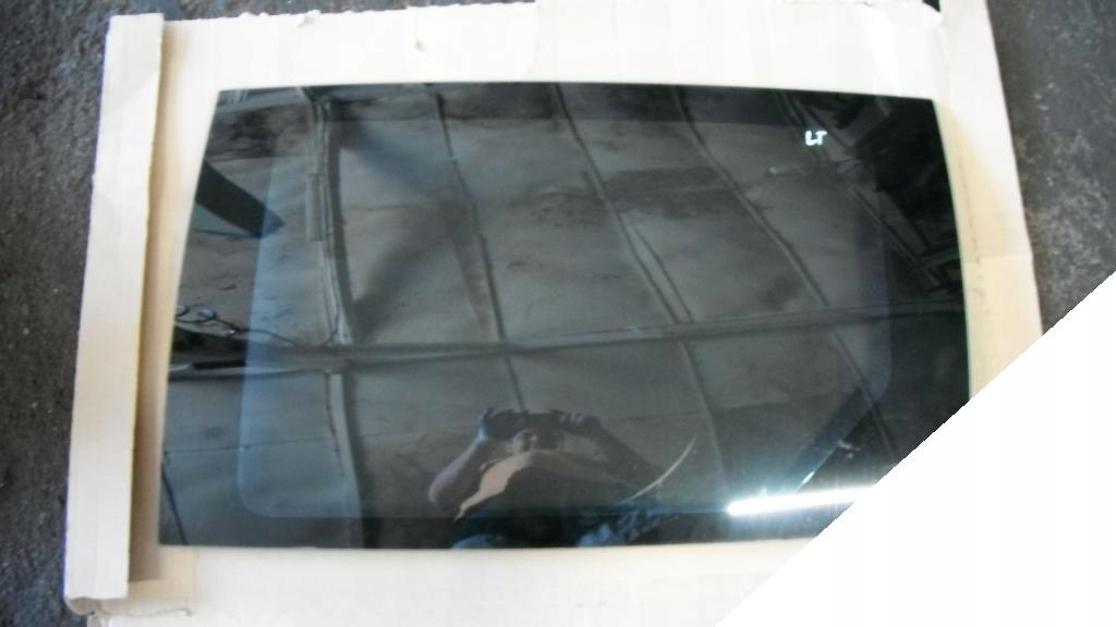 CHRYSLER VOYAGER 95-00 SZYBA ( z drzwi ) LEWA TYLNA - ZIELONA kolor AS2