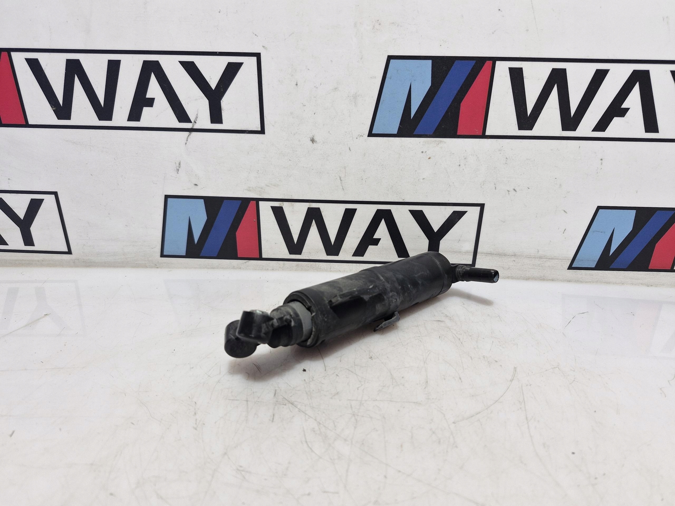 7321891 BMW X1 E84 DYSZA der Spritzdüse links Original