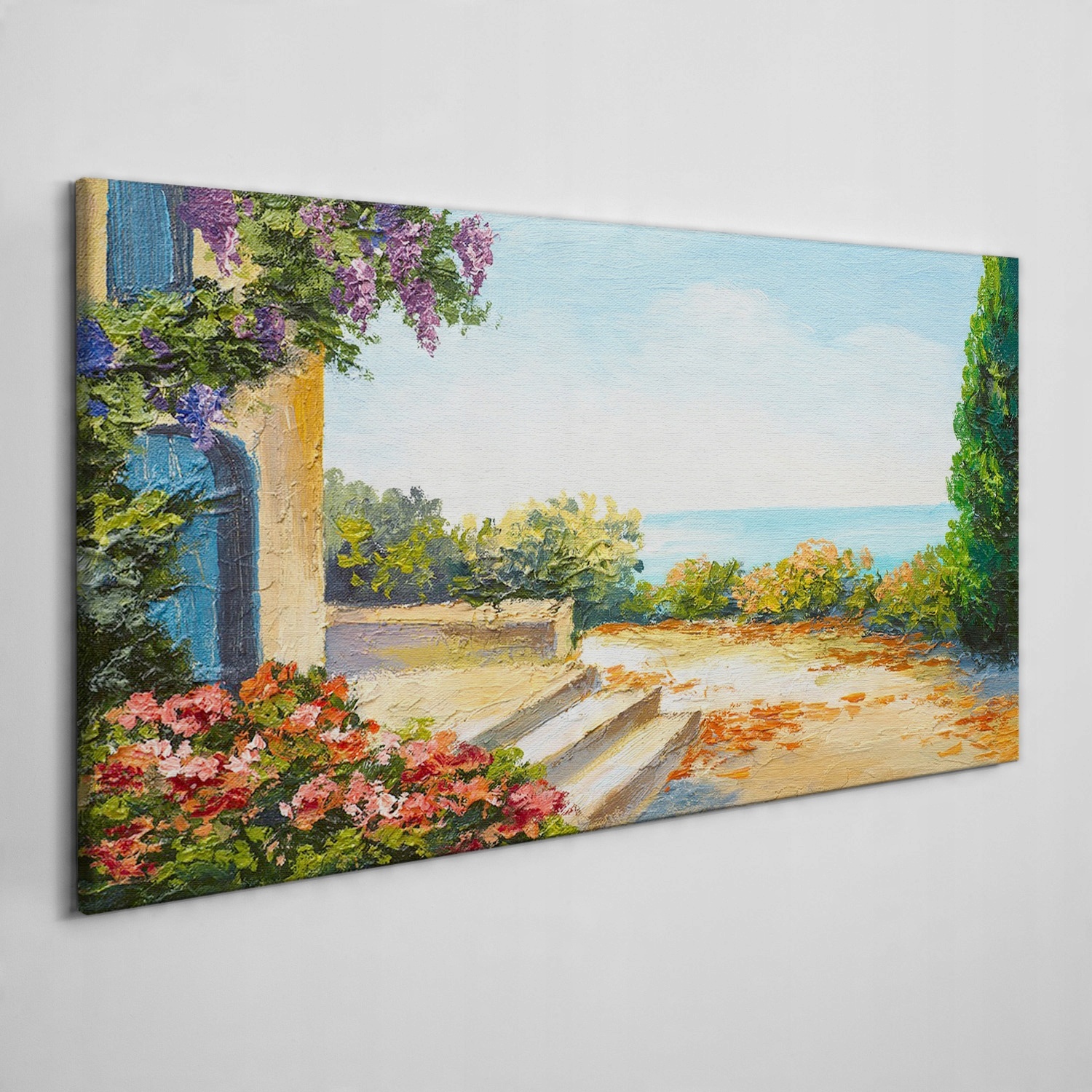 

Obraz płótno Wybrzeże kwiaty morze chmury 120x60