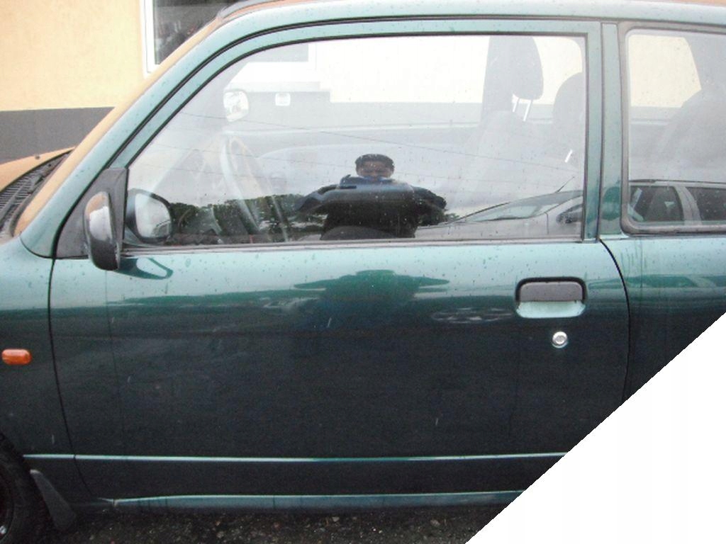 DAIHATSU CUORE L7 ZAMEK LEWY (PRZEDNI) + SIŁOWNIK