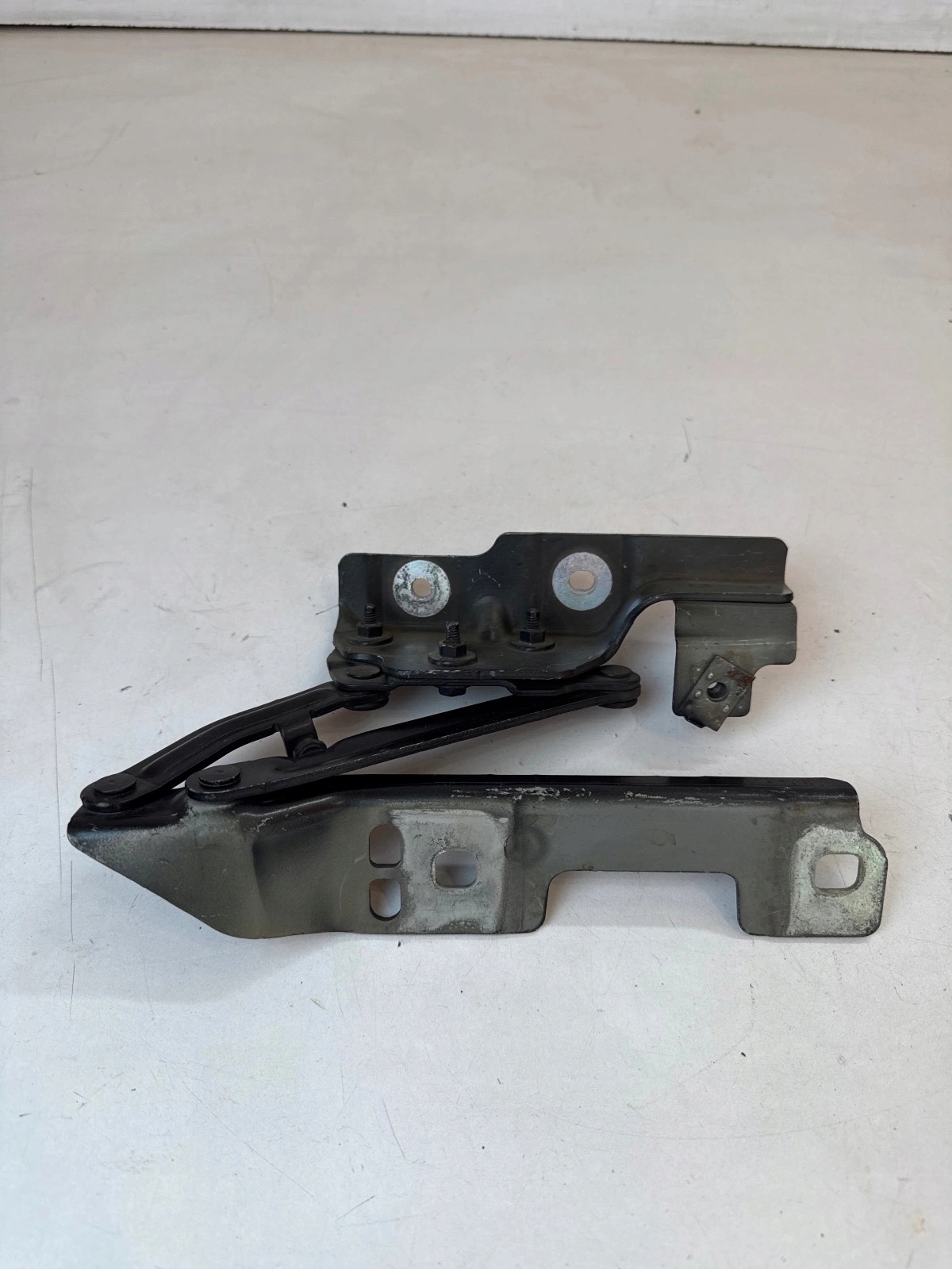 hinge bonnets front front left Opel Astra IV J