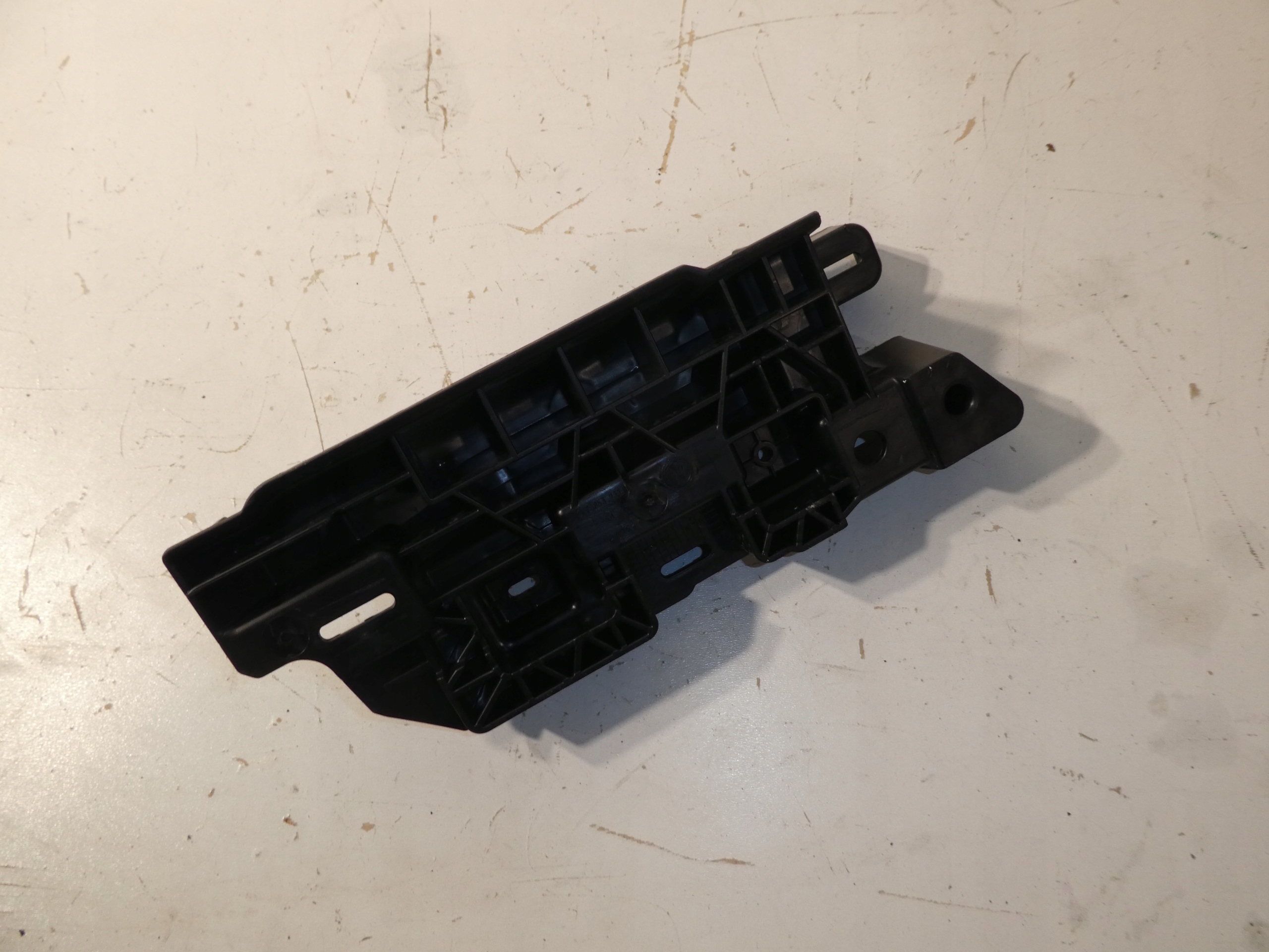 console holder bracket support VW CADDY 2K7 V2K7853232B