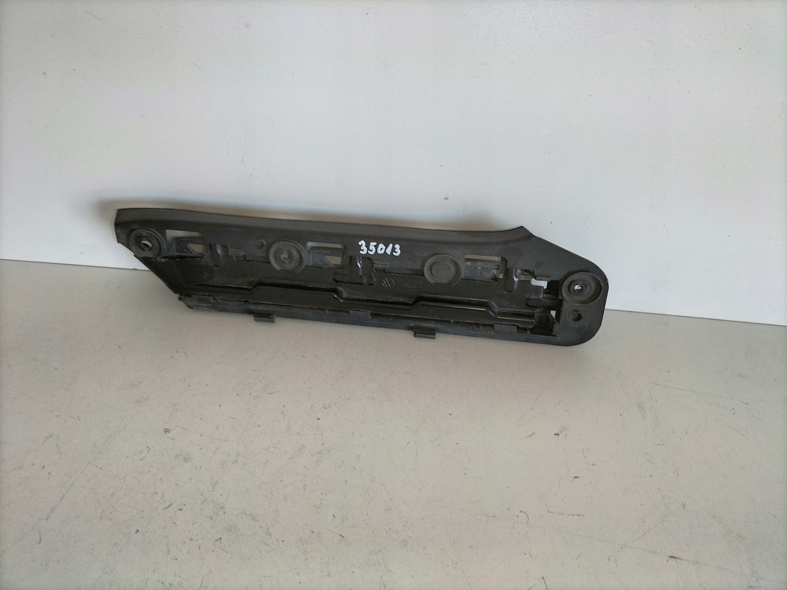 support holder of a bumper front left VW CADDY III 04-10