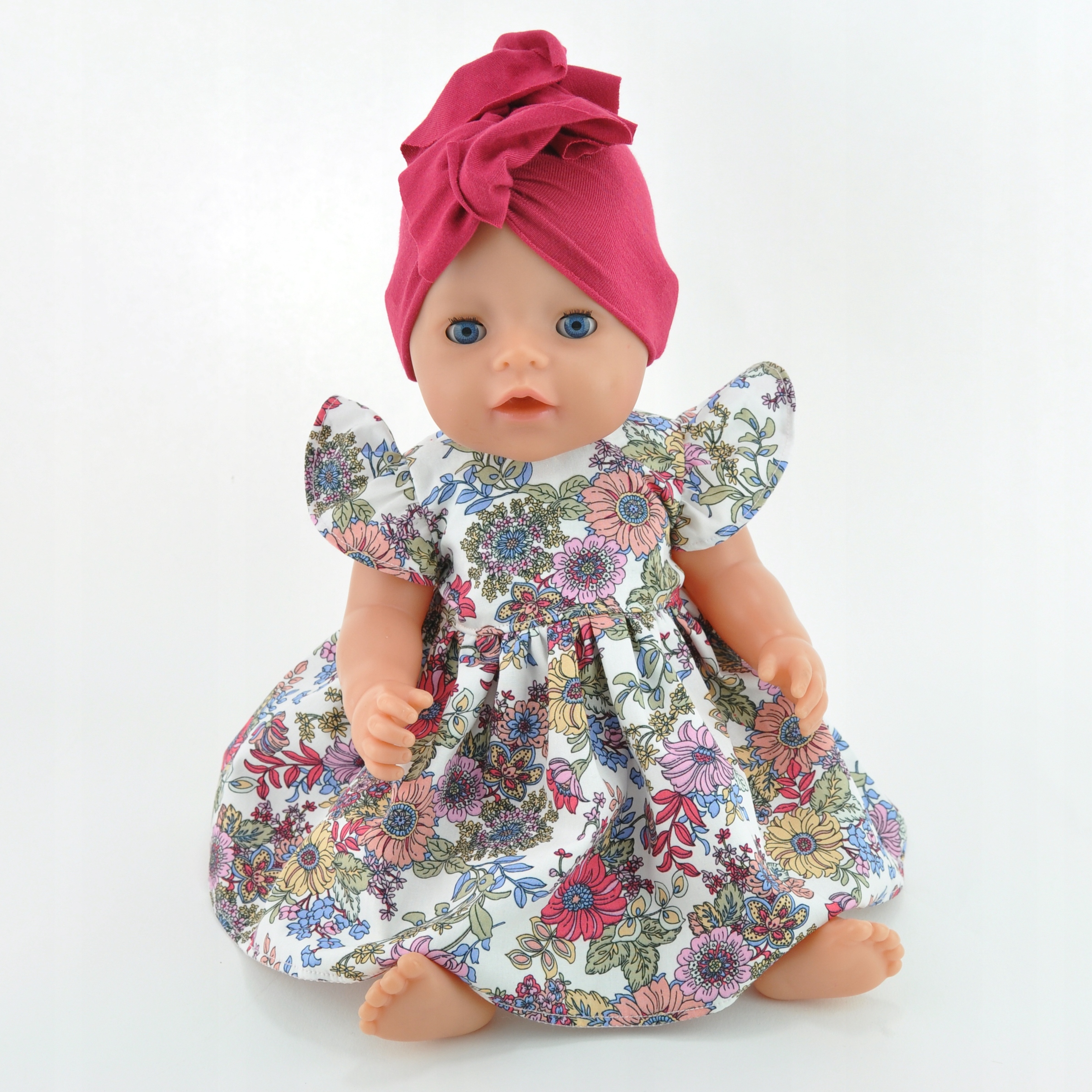 

Zestaw dla lalki Baby Born 43cm, sukienka i turban