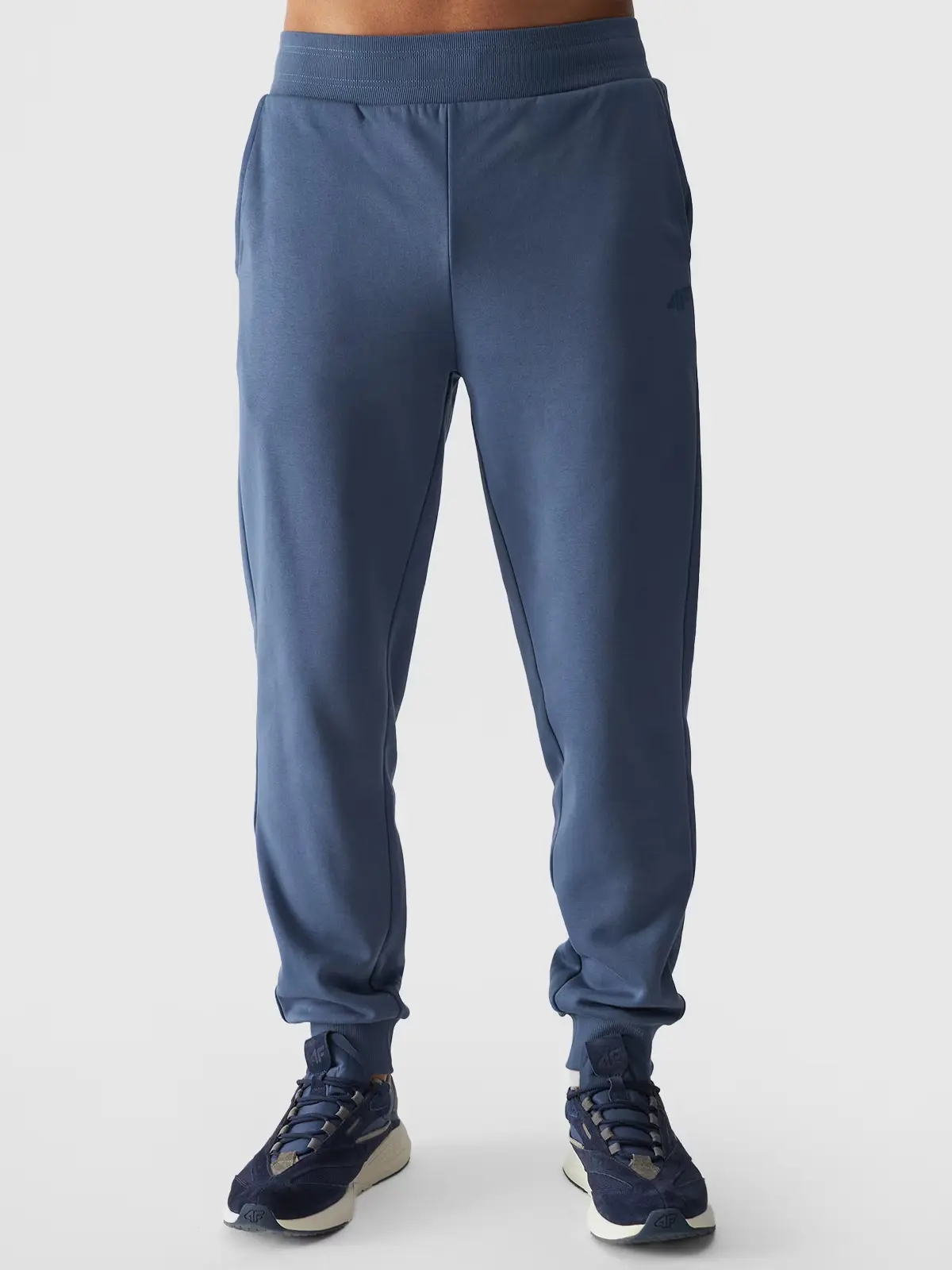 SPODNIE DRESOWE MĘSKIE 4F DRESY SPORTOWE JOGGERY BAWEŁNA WYGODNE M00T0943 Kolor niebieski