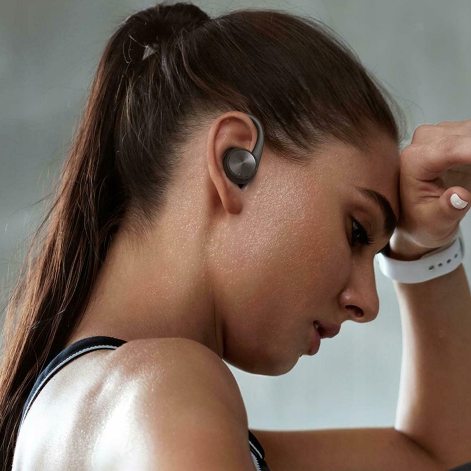 Sports bluetooth headphones for running power bank. Type of headphones behind the ear