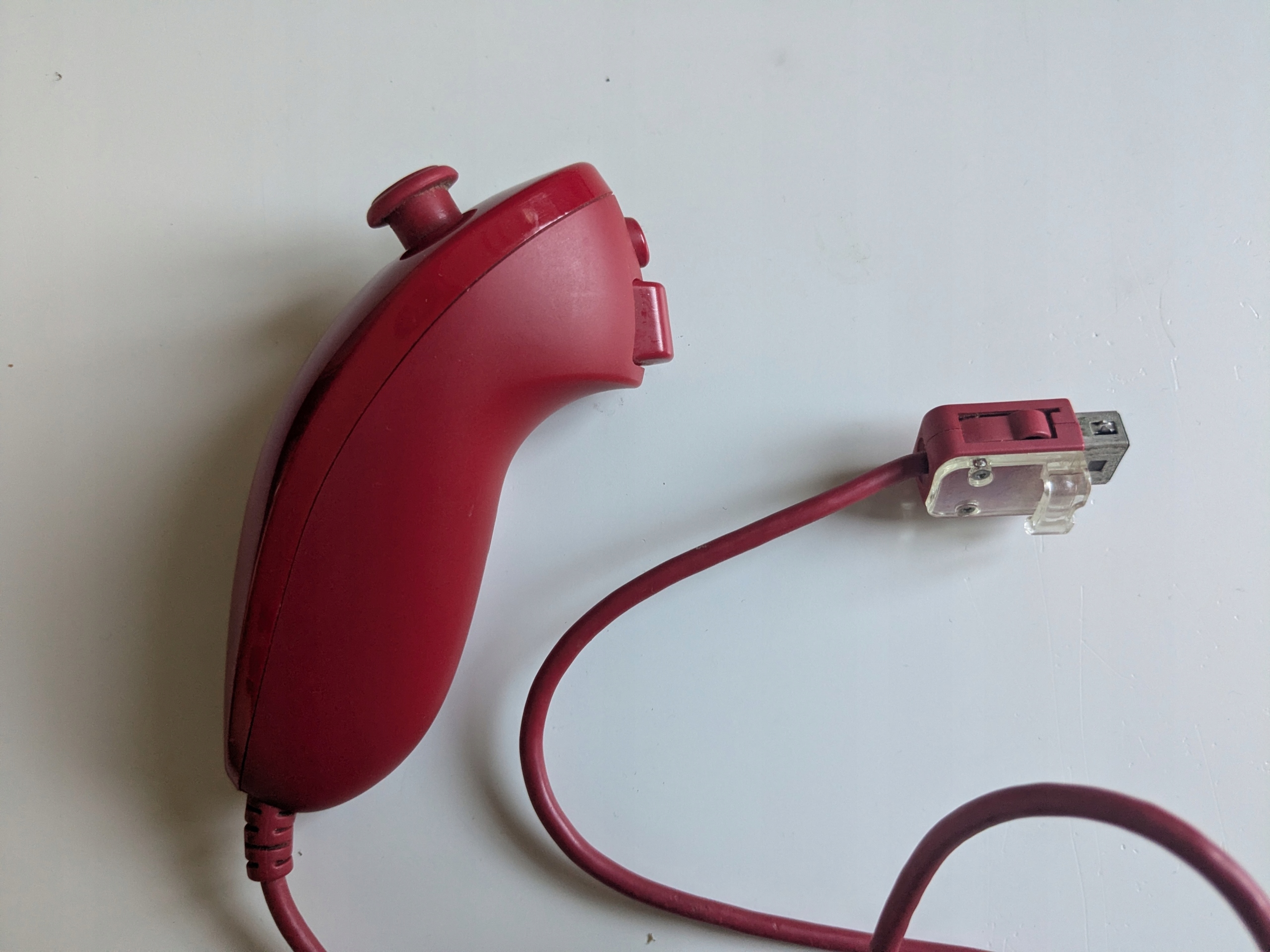 Nunchuck Nintendo Wii czerwony