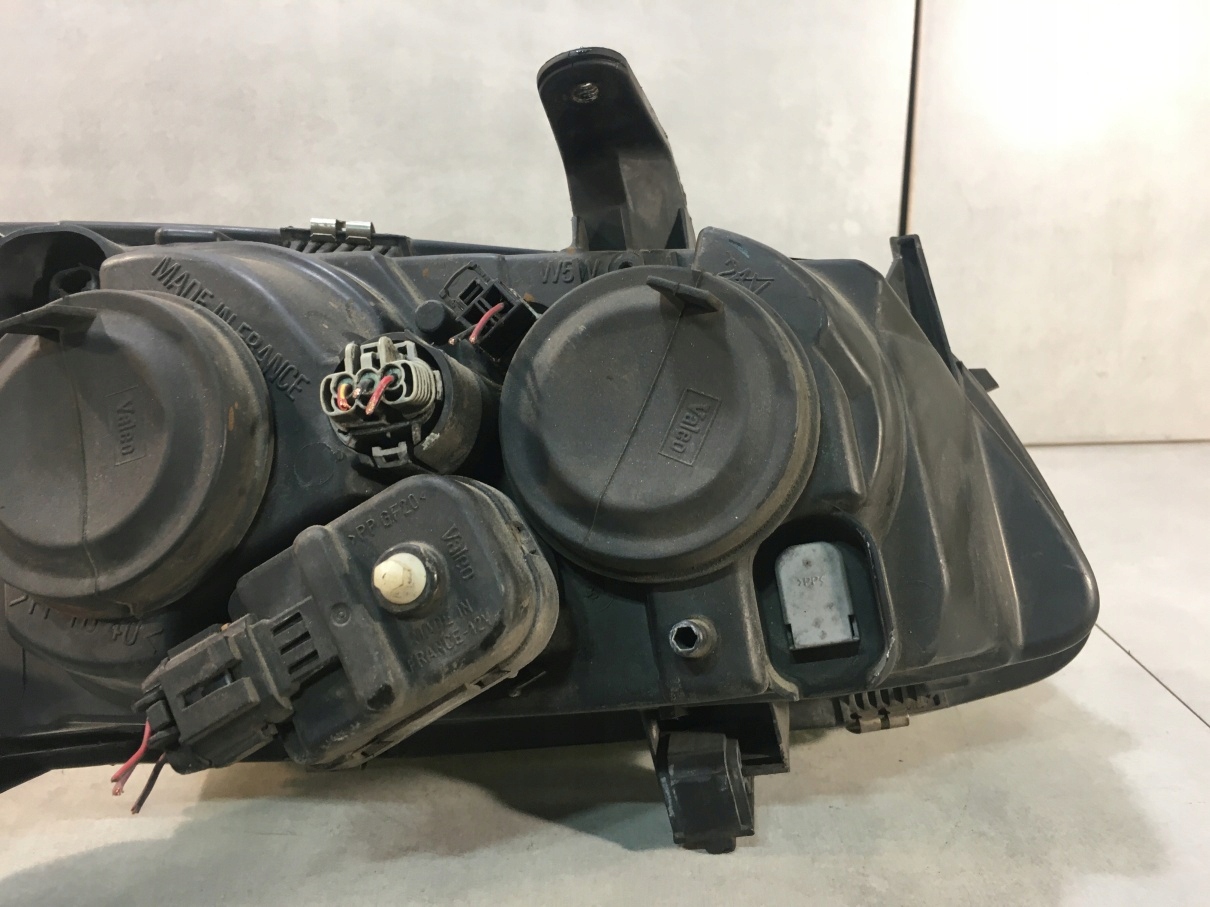 фара левая ALMERA N16 26060BN011 04HCR