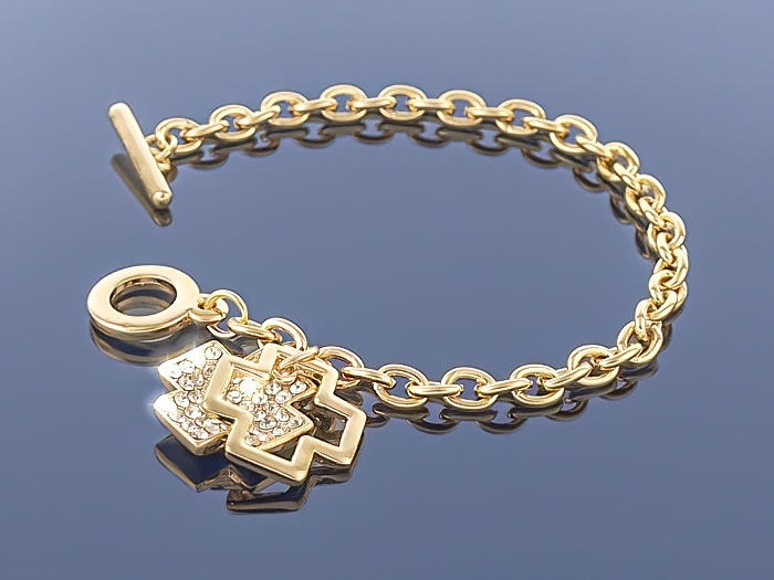 

Złota bransoletka Charms 14k