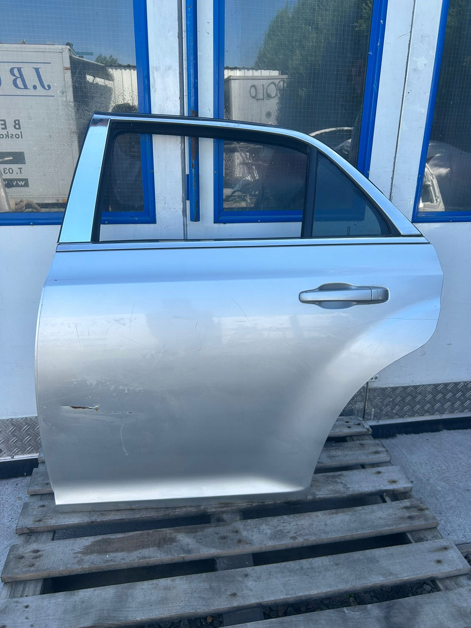 Chrysler 300c 2011- drzwi tylne lewe