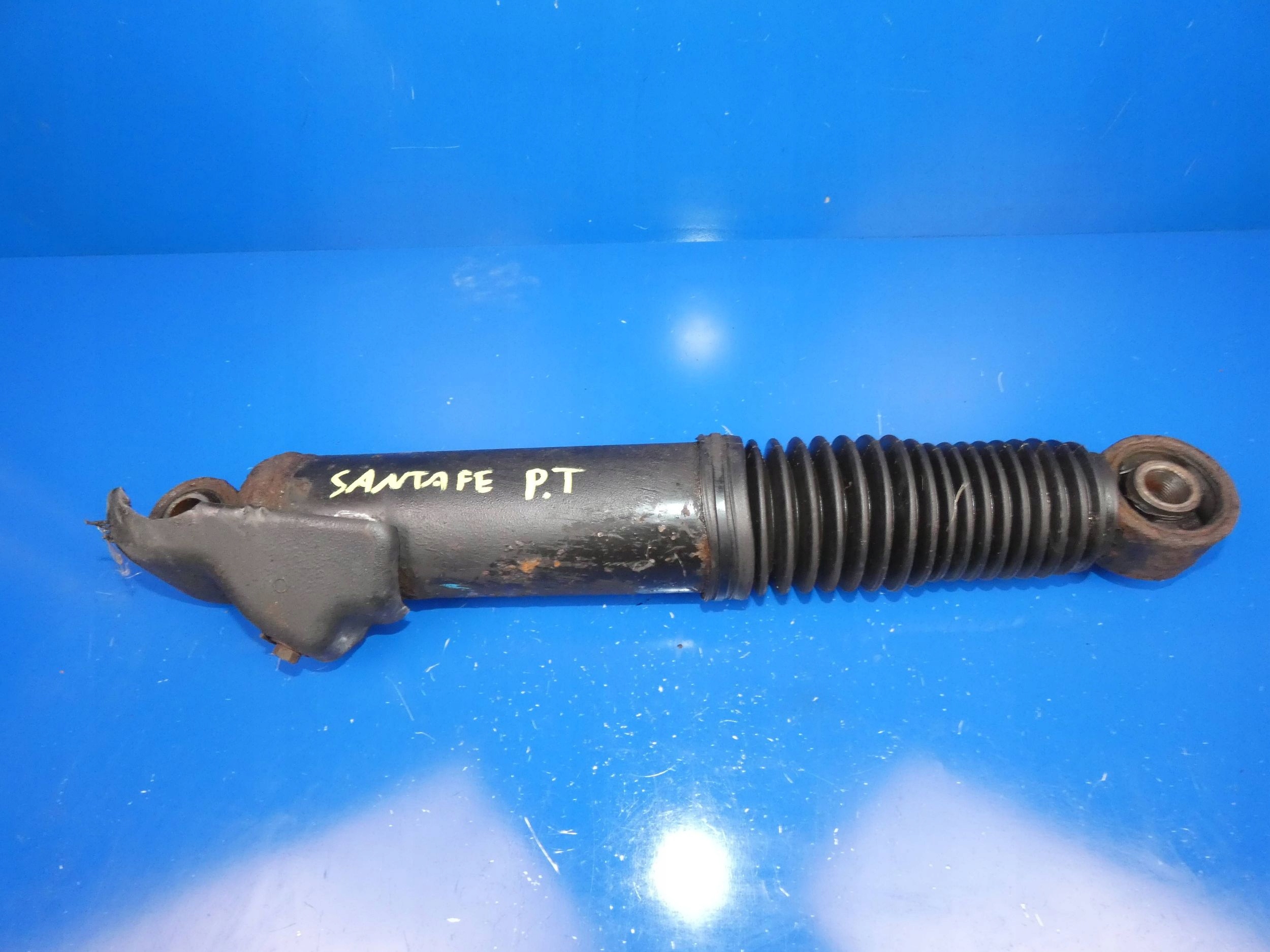 Hyundai Santa Fe III 2012-shock absorber left rear part rear