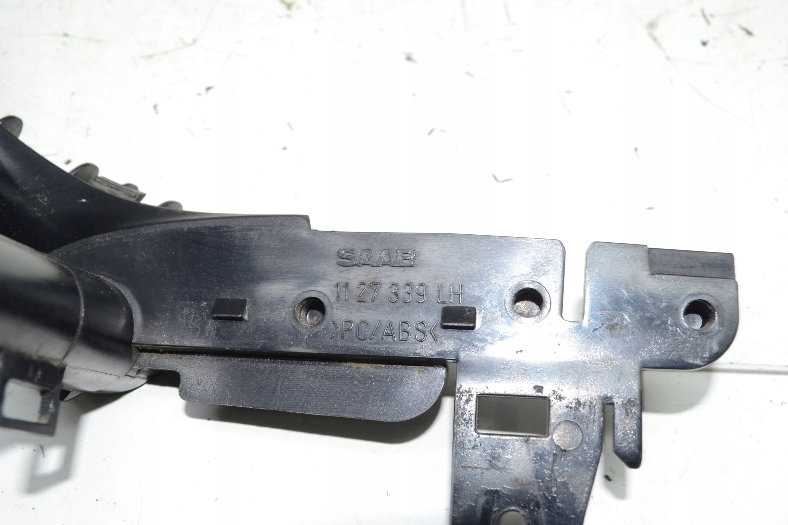 handle bracket door left front SAAB 93 9-3 02-11r 1127339