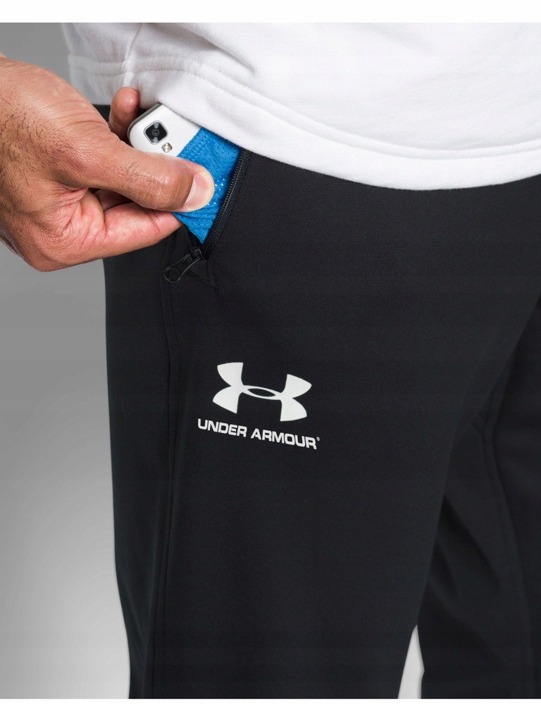 UNDER ARMOUR SPODNIE DRESOWE MĘSKIE JOGGERY SPORTOWE ZAMEK W KIESZENIACH Model SPORTSTYLE TRICOT JOGGERY SLISKIE MĘSKIE 1290261
