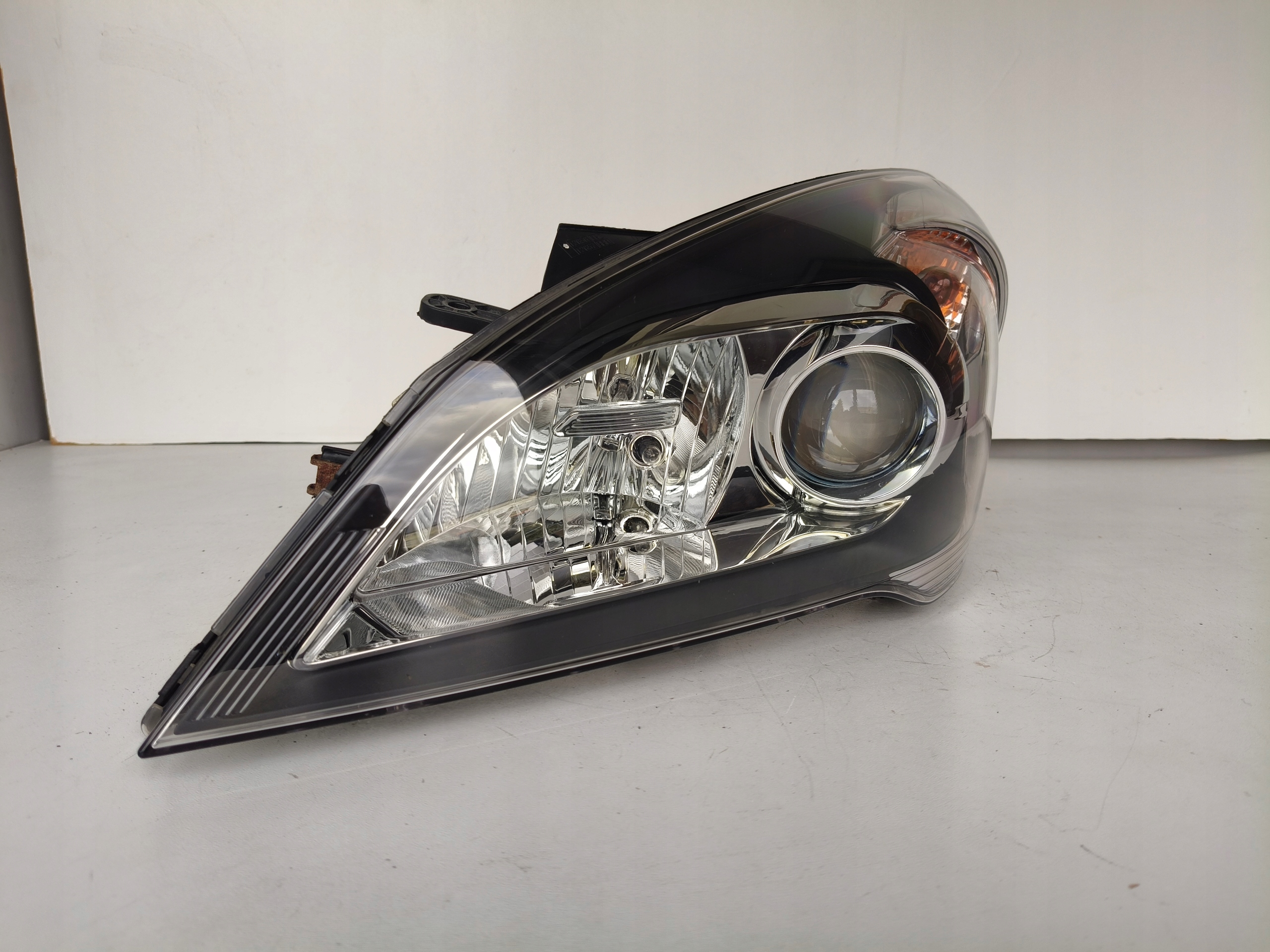 light left REFLEKTOR KIA CEED 09- LIFT