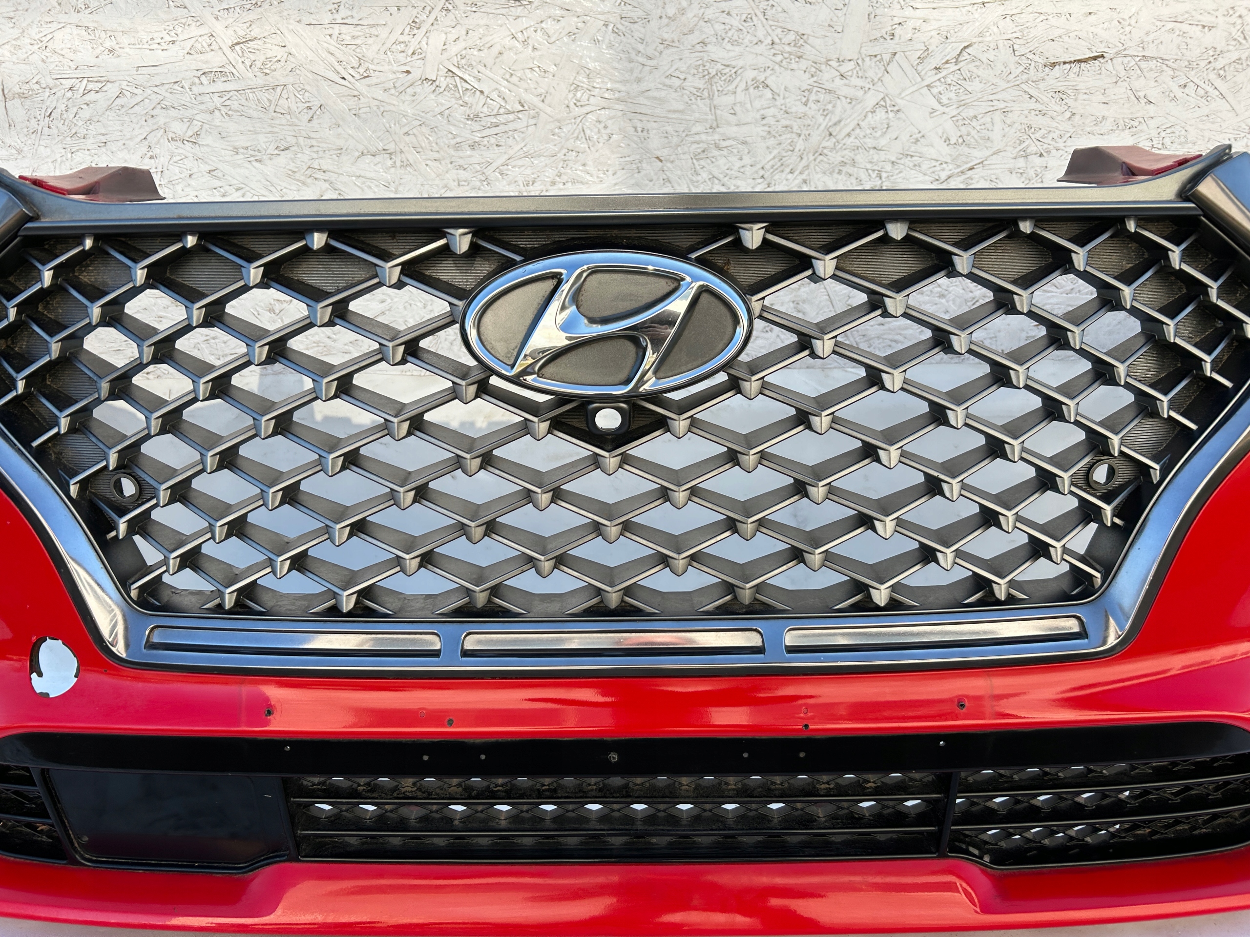 TUCSON II III 18-20 LIFT N-LINE ZDERZAK PRZÓD ORYGINAŁ 86511-D7700 GRILL Strona zabudowy przód