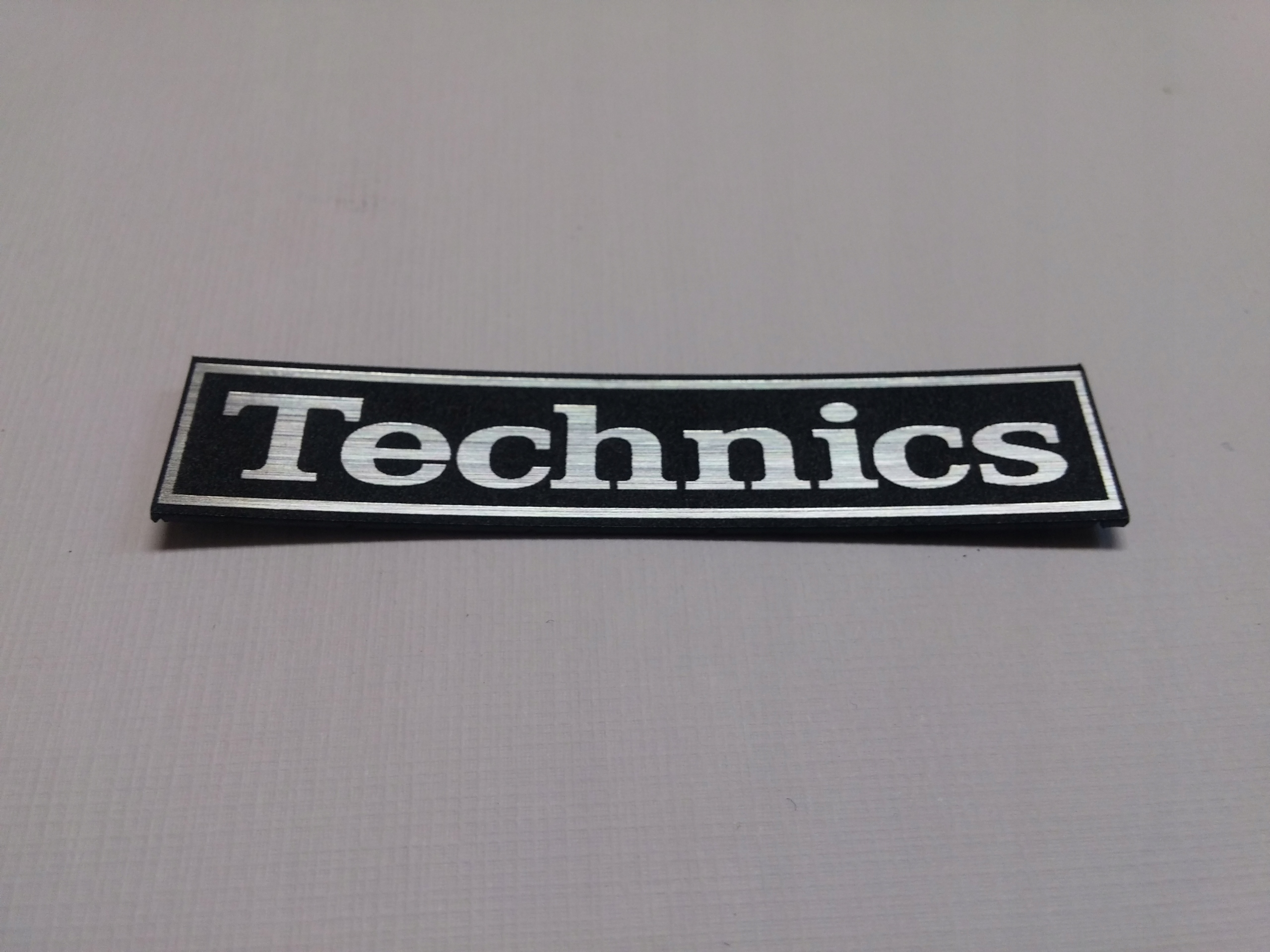 

Technics naklejka emblemat 64 x 13 mm * Srebrna