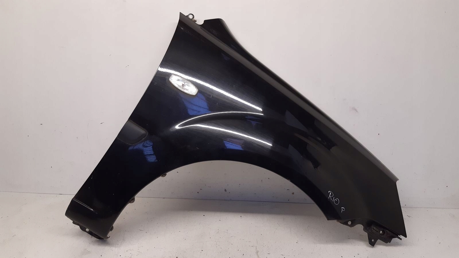 fender right front front Kia Rio II 9B