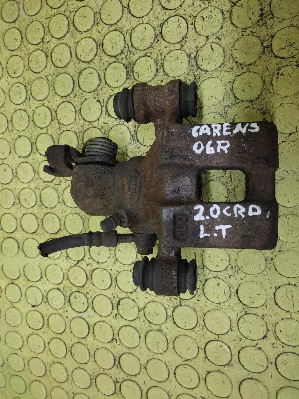 KIA CARENS 2.0 CRDI caliper left rear part