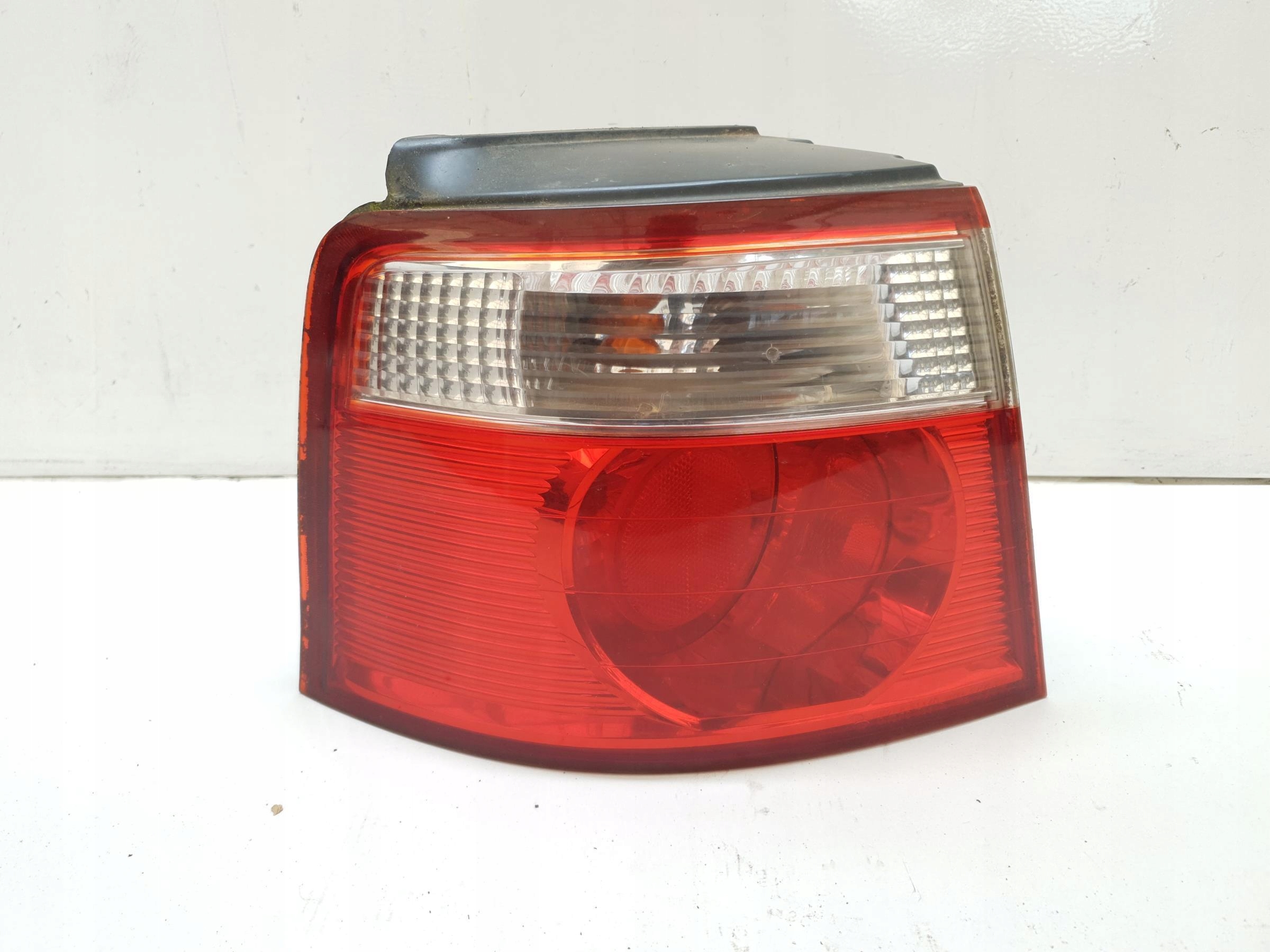 фонарь левый kia CARENS II