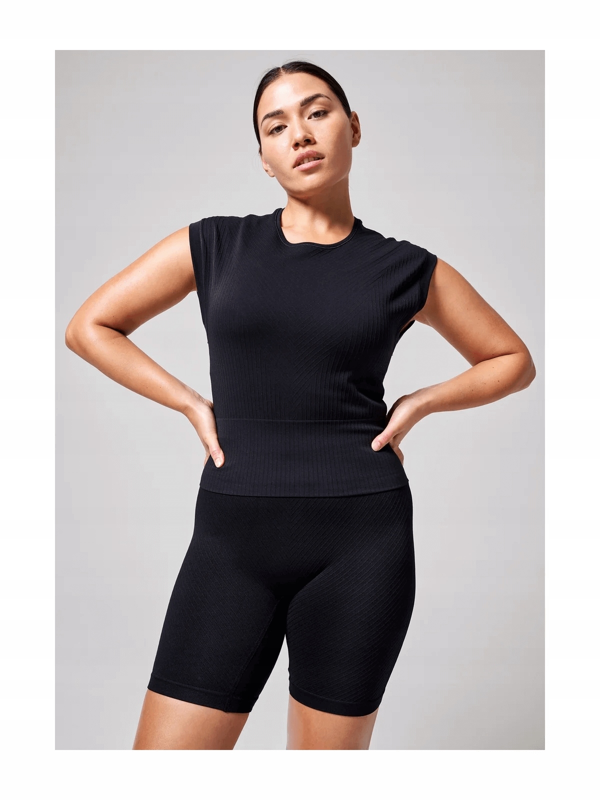 Dámské sportovní tričko Casall Seamless Graphical Rib Tee L černé