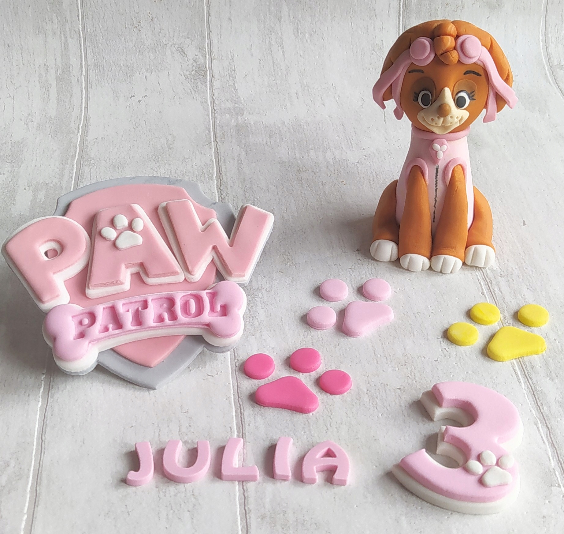 Levně Tlapková patrola Skye logo jméno číslice tlapky Sada z cukrové hmoty