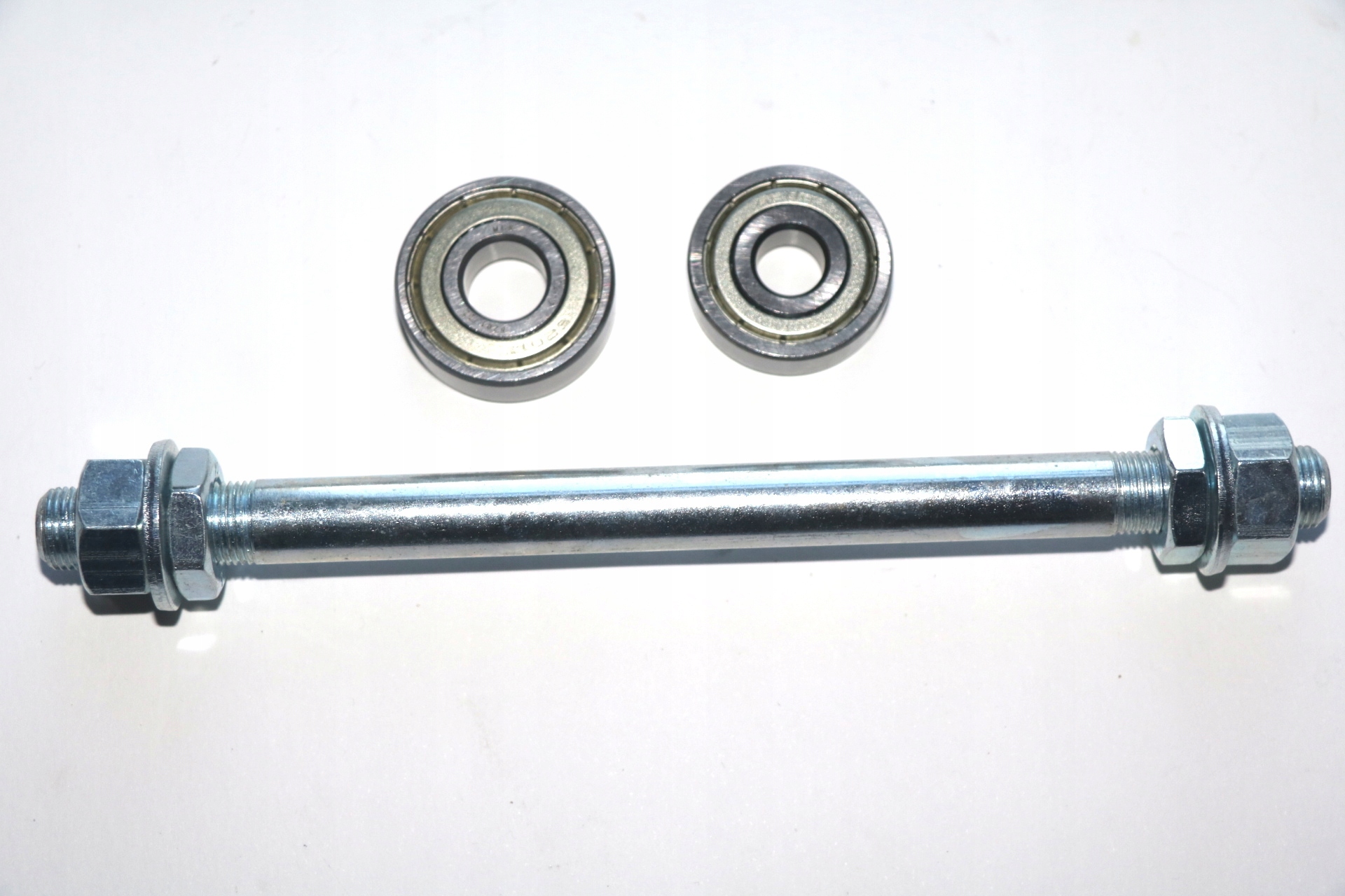 OŚ OŚKA KOŁA TYLNEGO TYŁ ROMET OGAR KOMAR+ ŁOŻYSKA