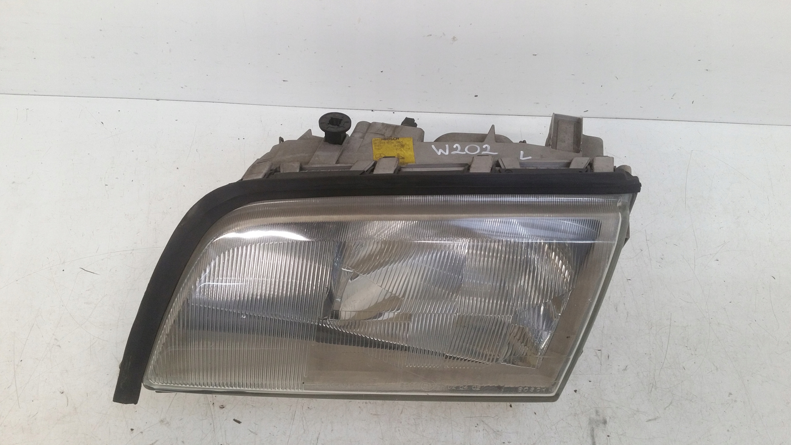 light left front Hella 2028201761 Mercedes W202