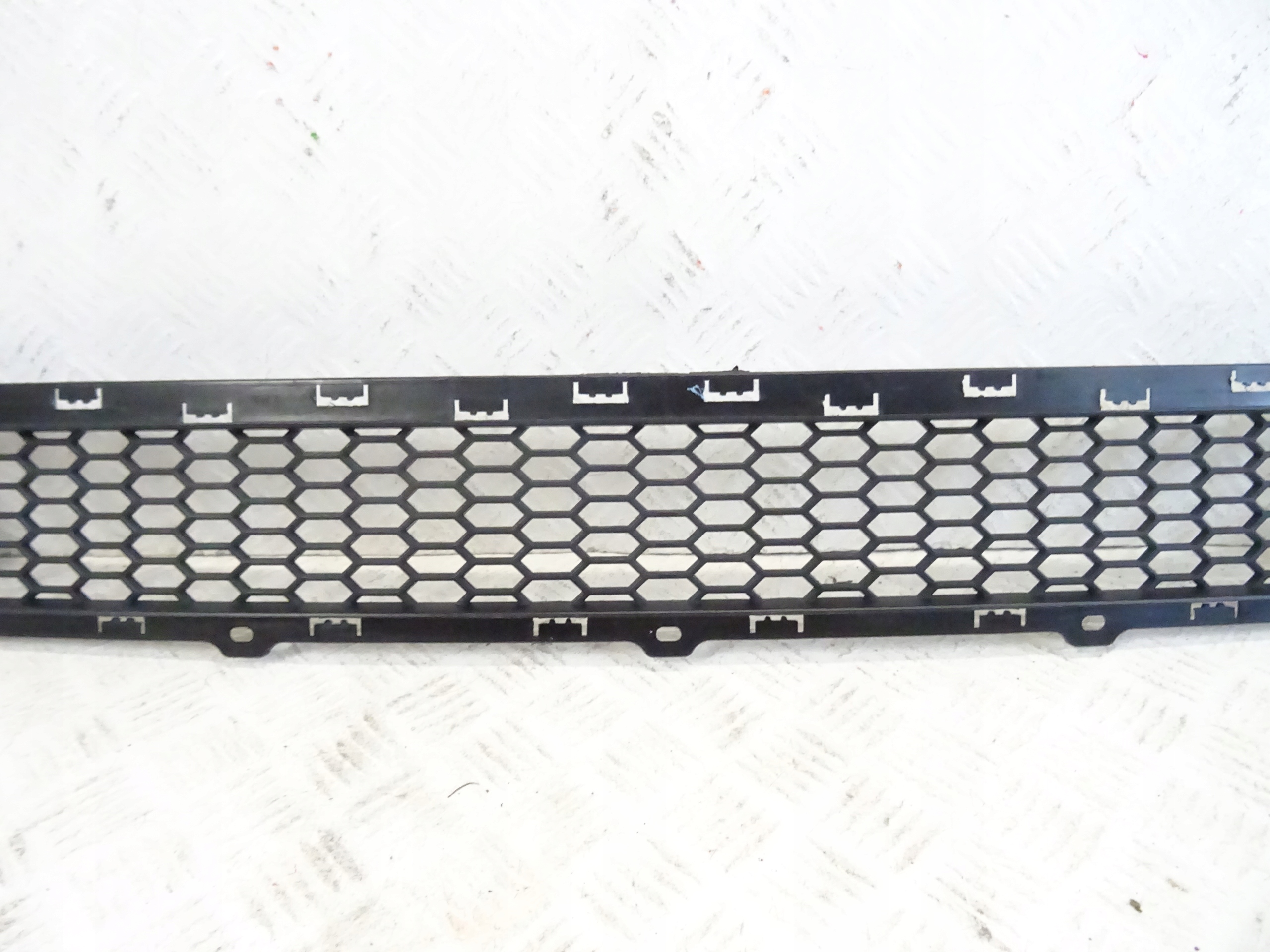 grid of a bumper front front central HYUNDAI TUCSON III 86561-D7000