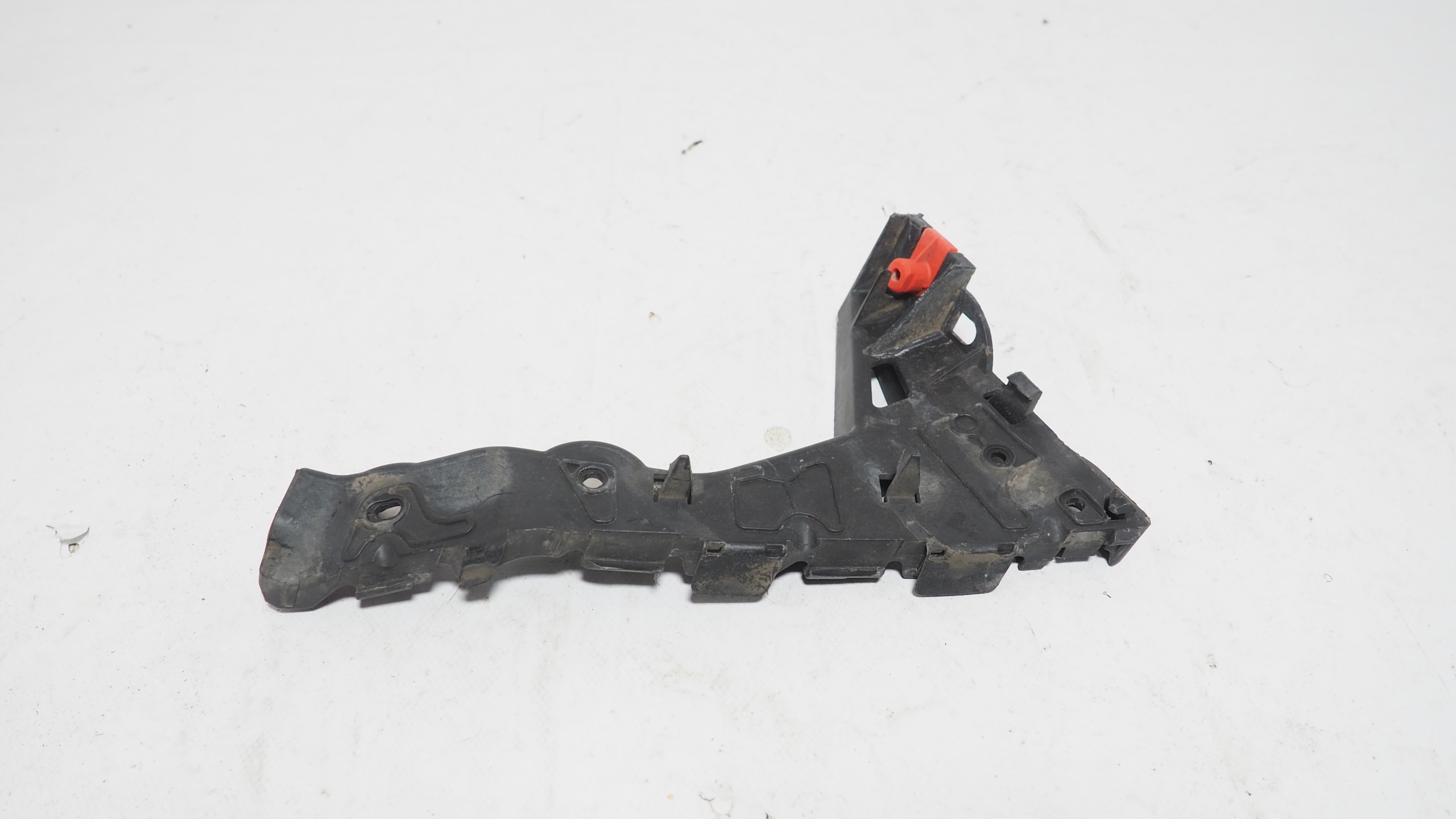 Opel Astra III H bumper bracket right front 24460284