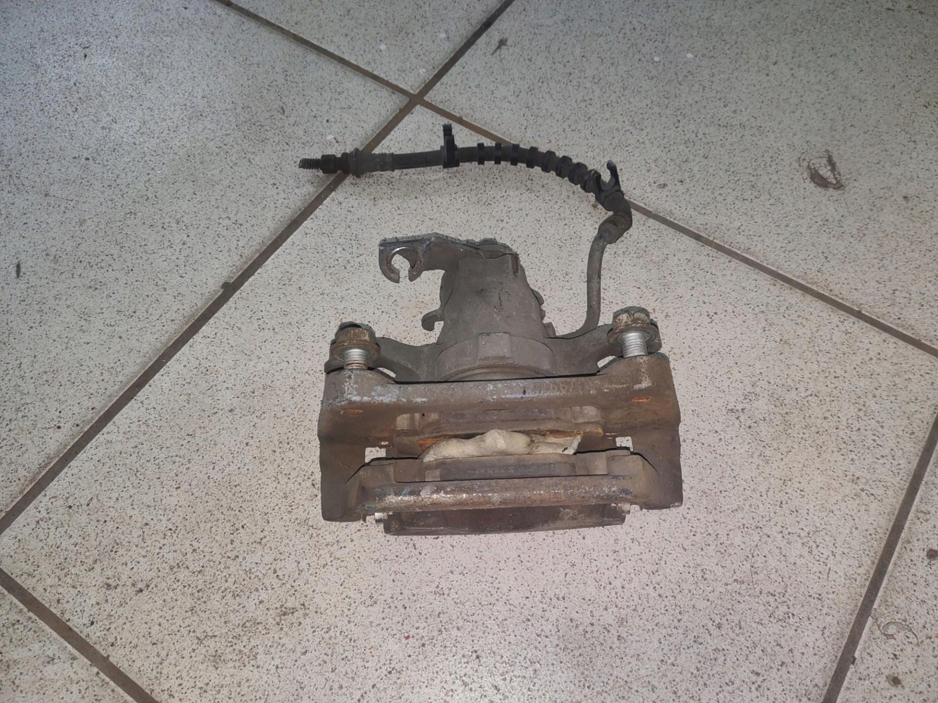 caliper brake rear part right side Chrysler Town and Country 5 facelift 2012