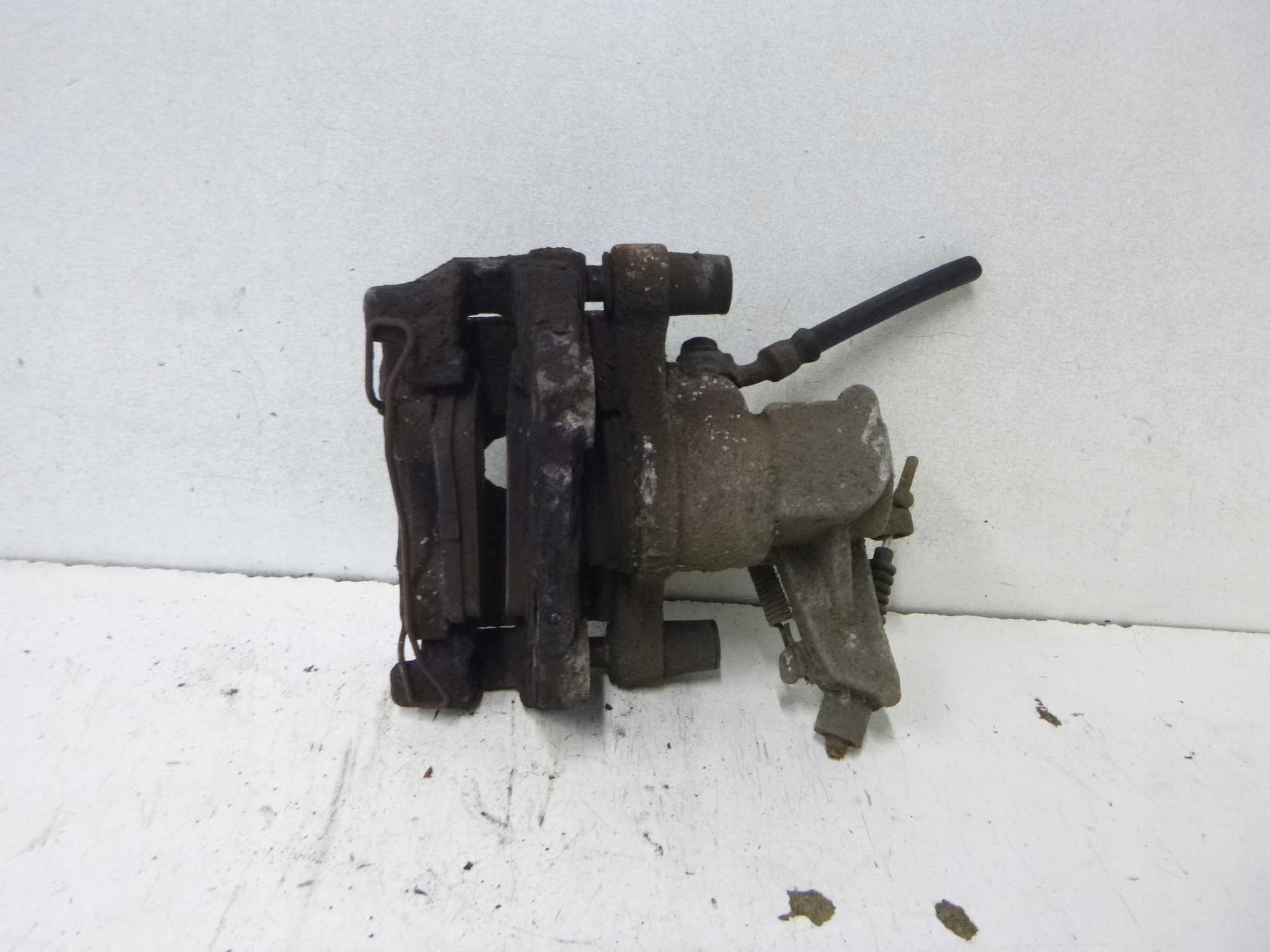 caliper brake rear part left Opel Vectra C 1.8 02r.