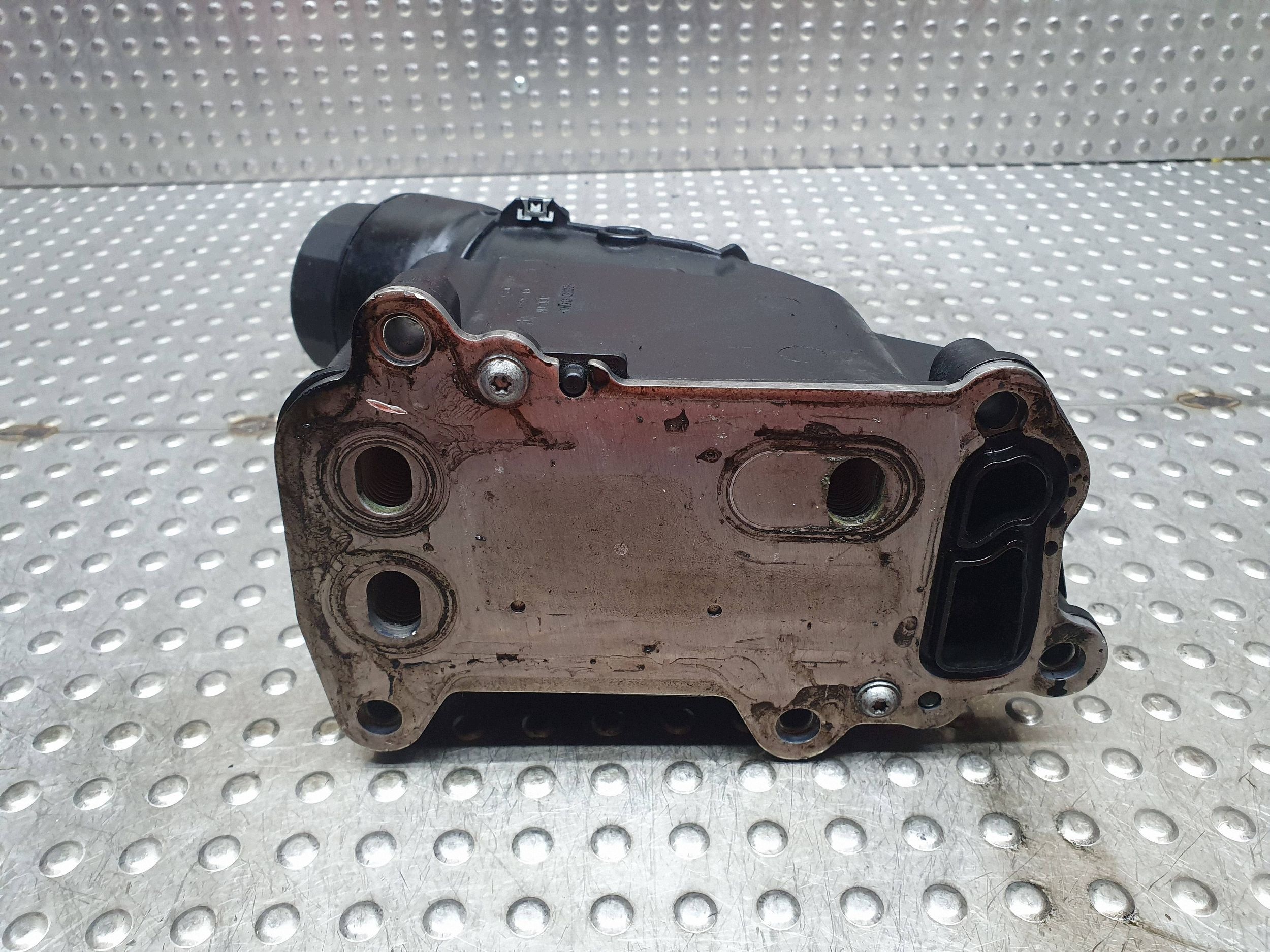 oil filter holder 7807799 BMW E90 E83 E87 E91 E60 E88 E92 E93 2.0D N47