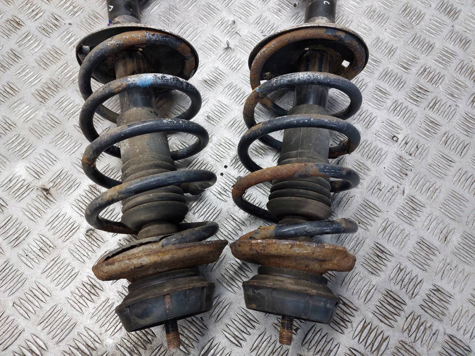 shock absorber spring swing left front + right front DACIA LOGAN and