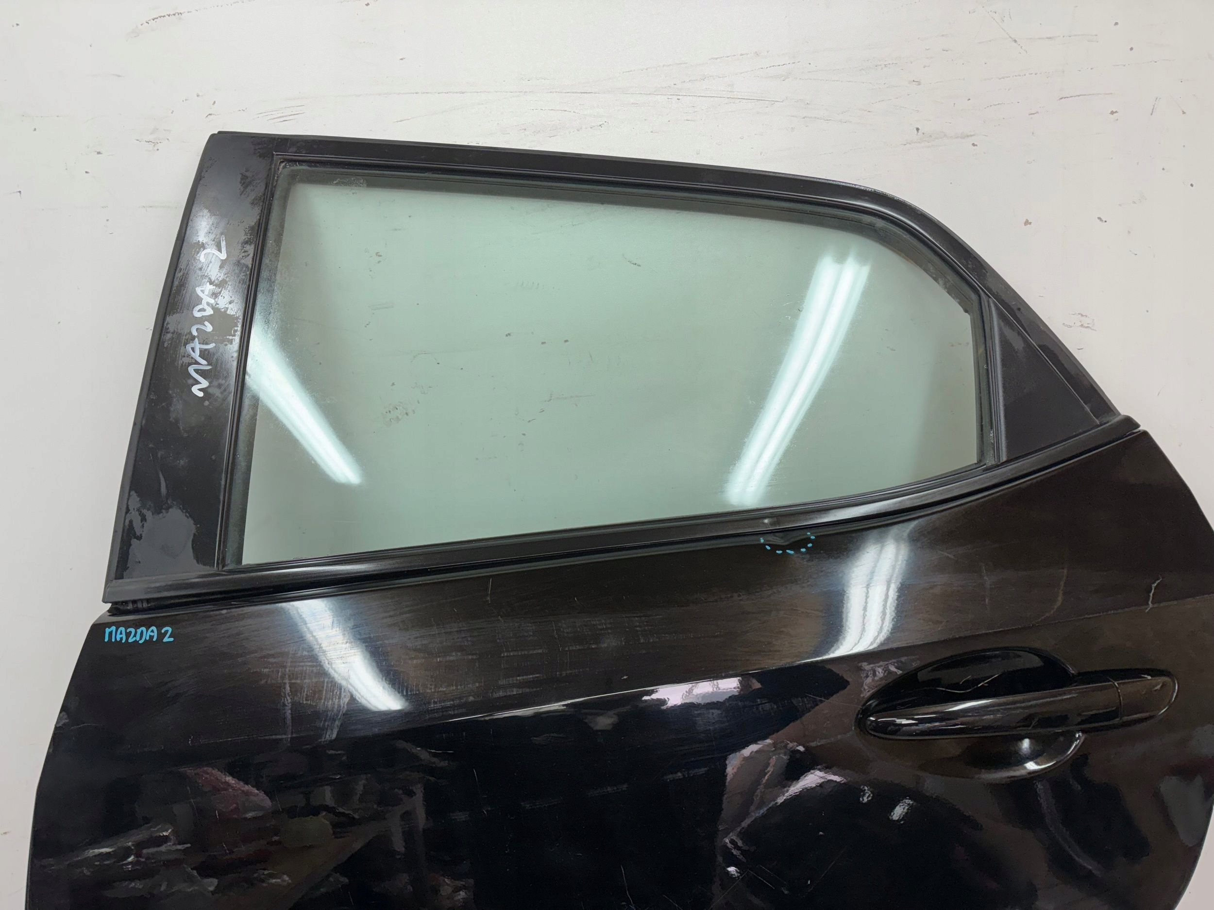 ajtó far hátsó bal MAZDA 2 DE 07