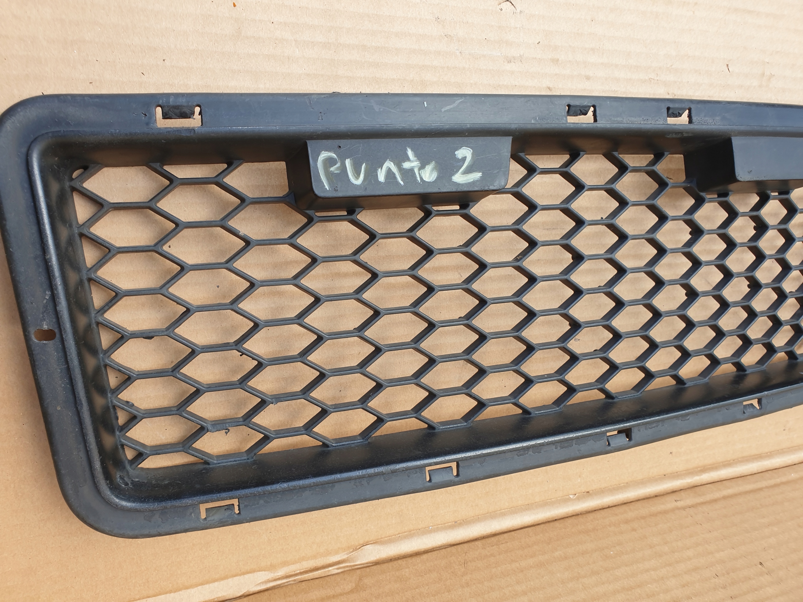 grid spoiler of a bumper front FIAT PUNTO II OE EU