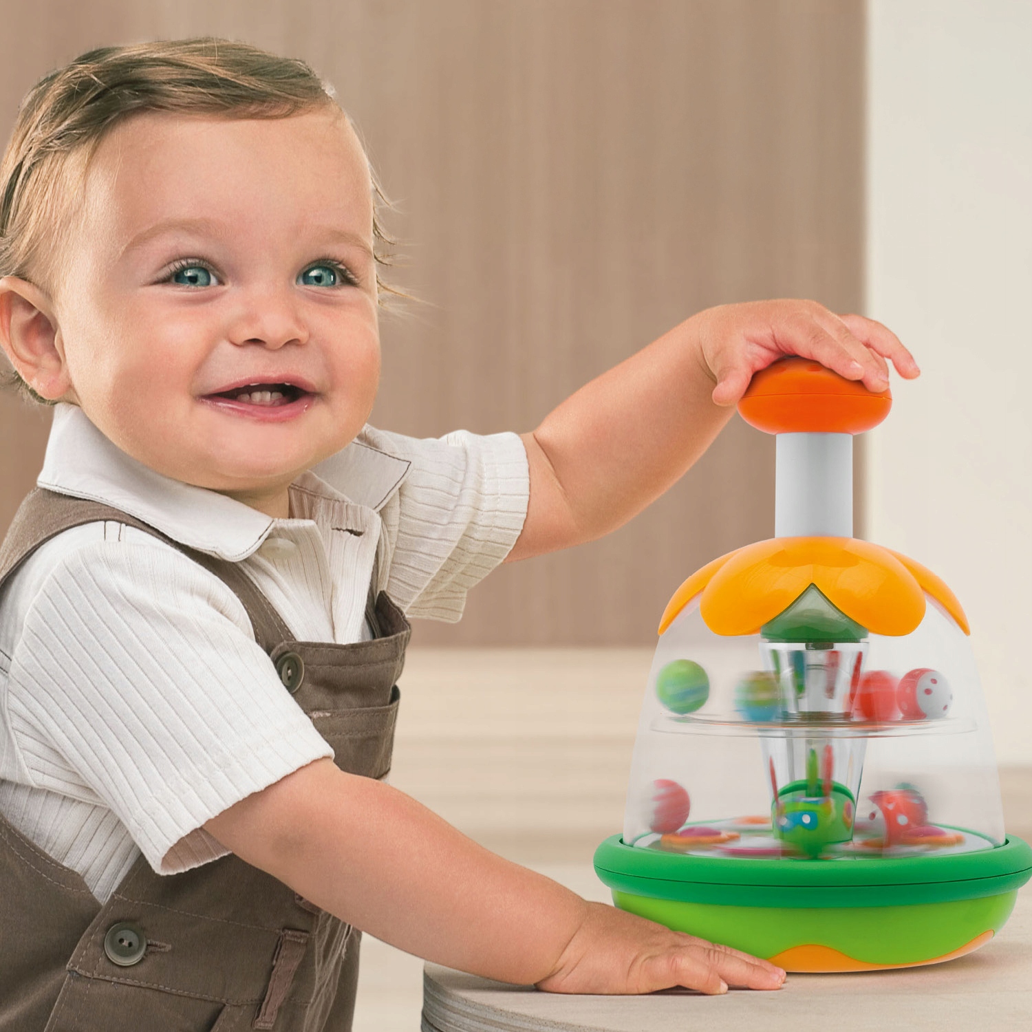 KOLOROWY TRADYCYJNY MECHANICZNY BĄCZEK WCISKANY WIRUJĄCE KULECZKI CHICCO Wiek dziecka 6 m +