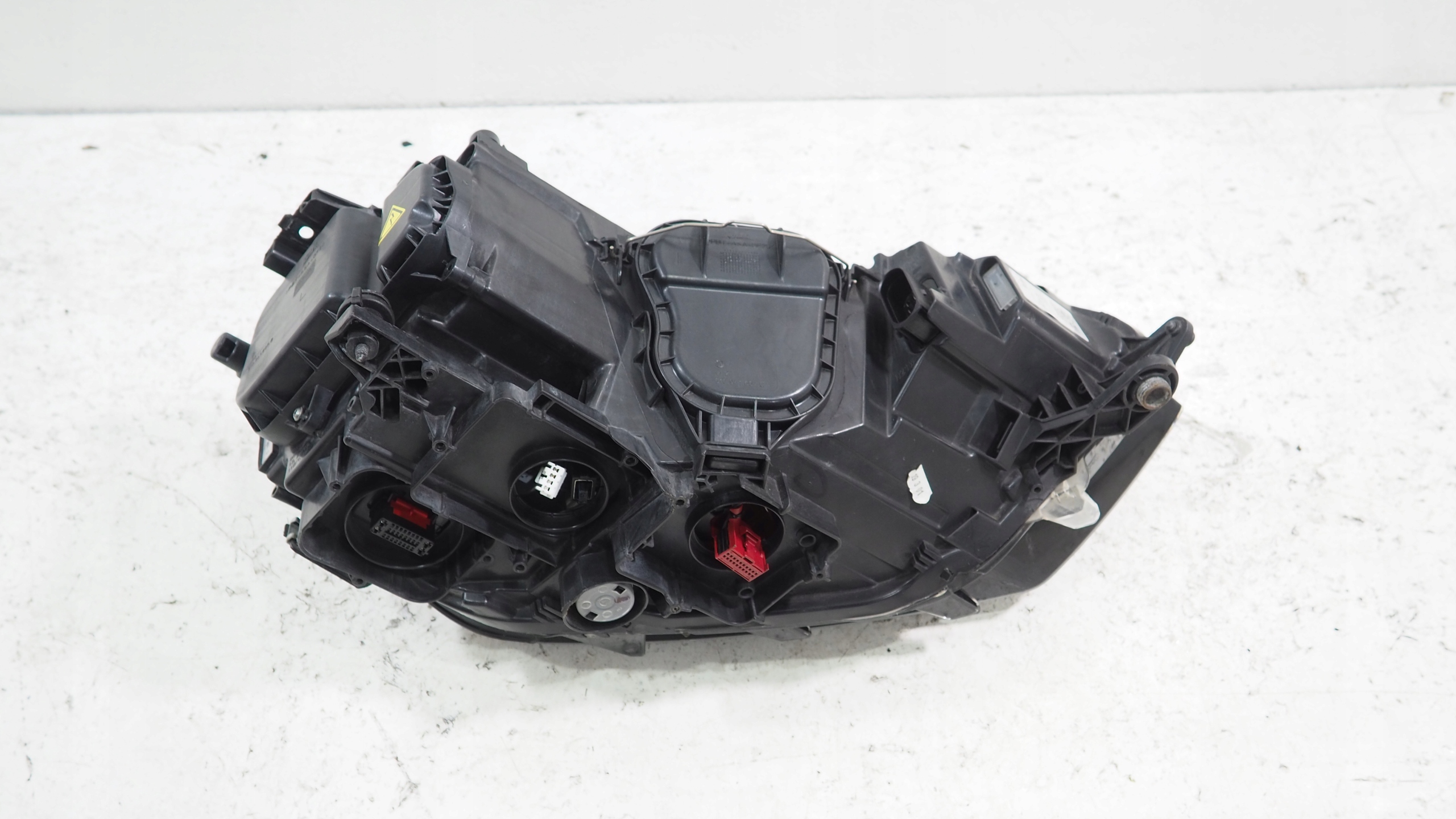 VW Golf VII Sportsvan light Bi Xenon left front 517941033B