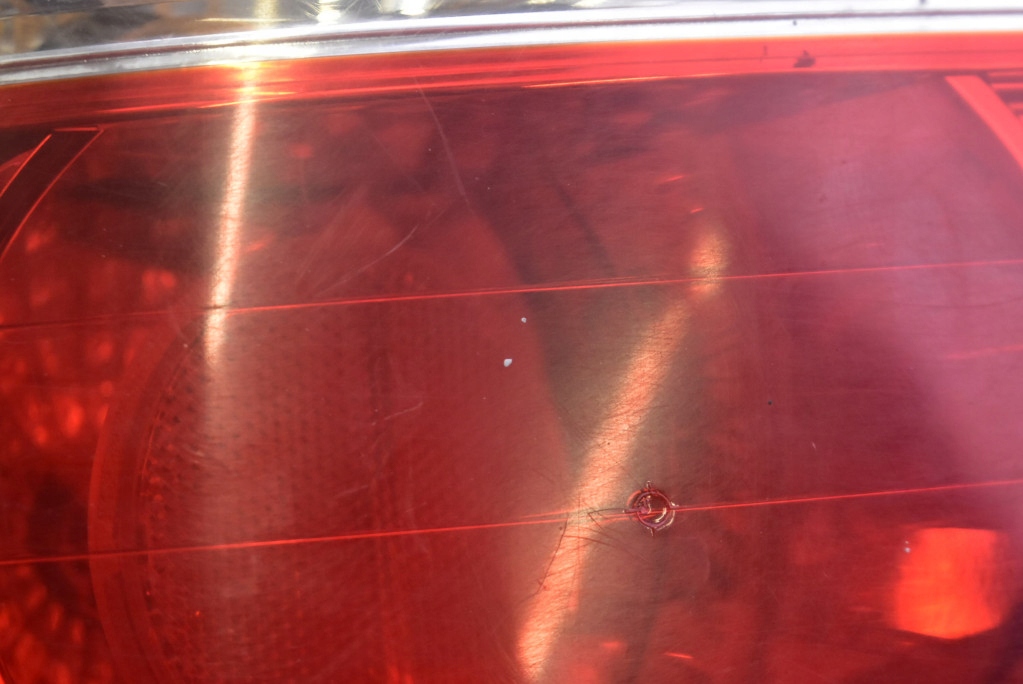 фонарь левый kia CARENS 2 II 02-06