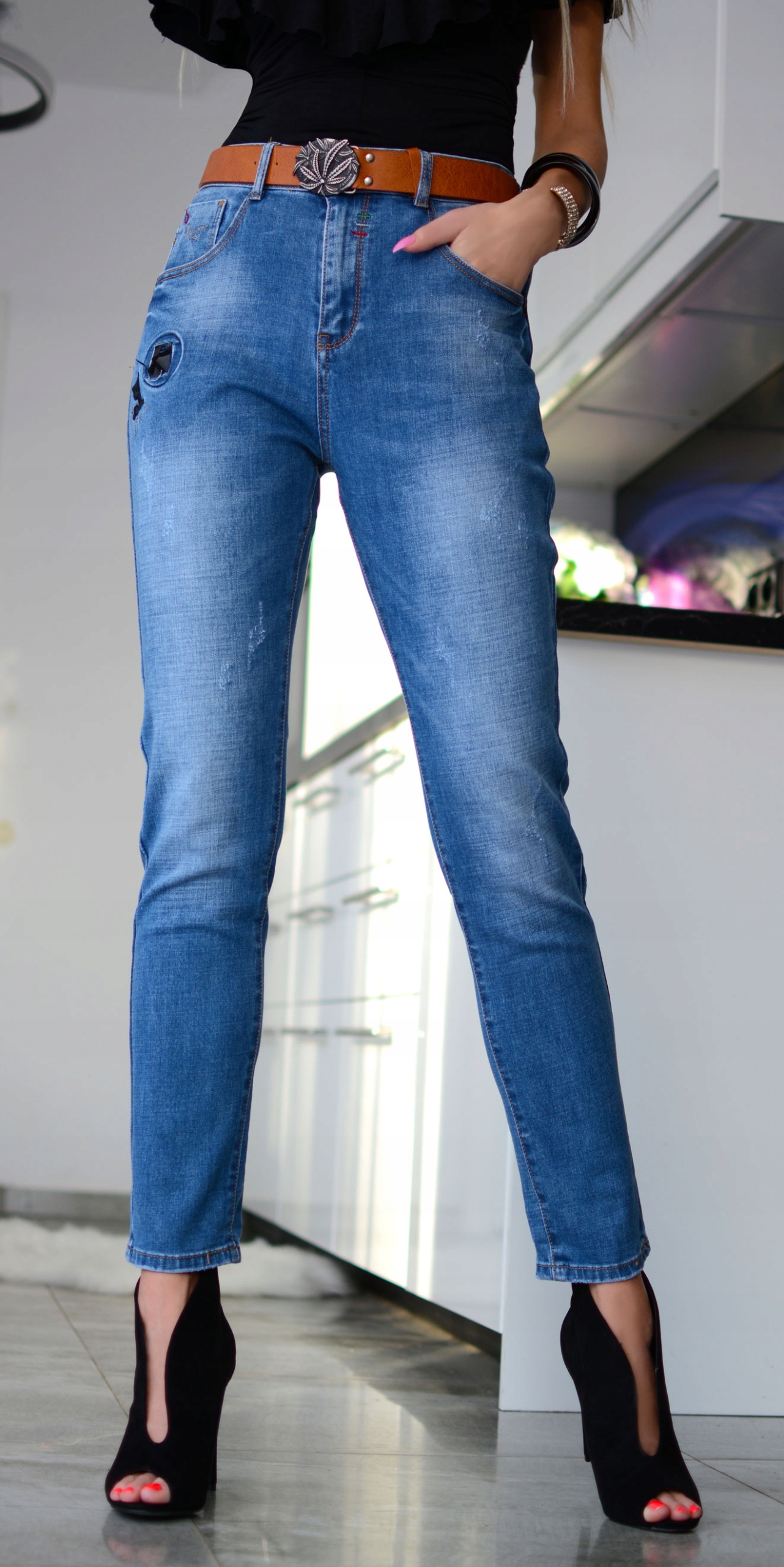 SPODNIE JEANSY DAMSKIE PRZETARCIA WYSOKI DUŻE 343 Model FOR ADDAMSCOLLECTION