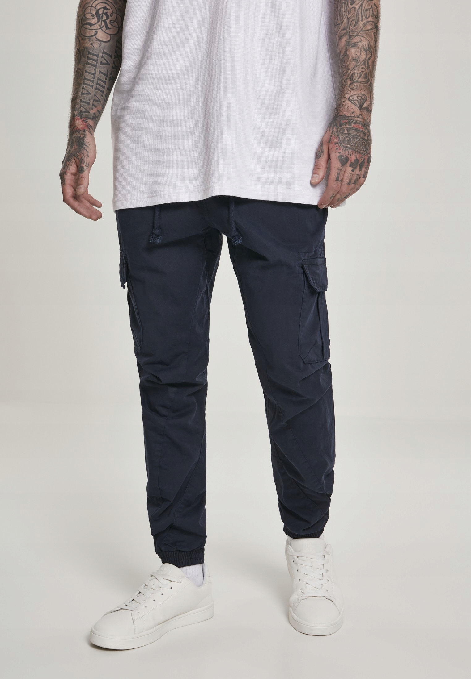

Spodnie Joggery Urban Classics Nike Cargo Navy 5XL